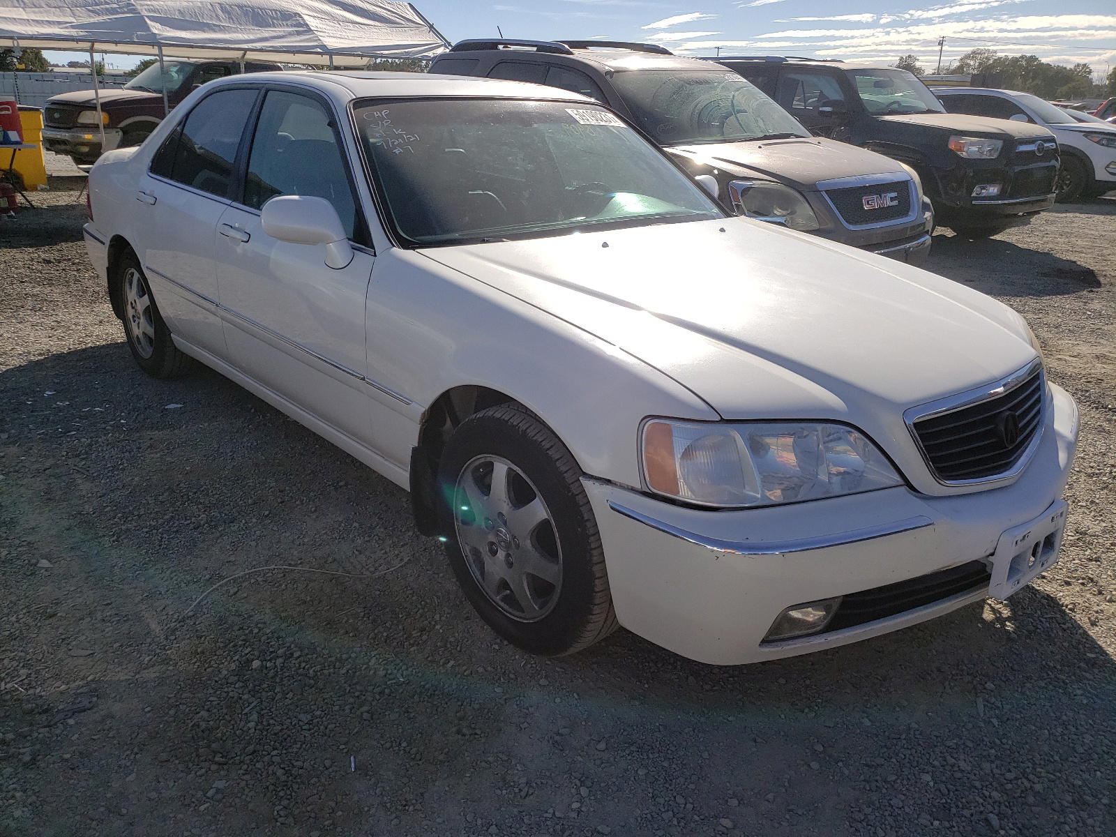 ACURA 3.5RL 2002 with VIN JH4KA96582C010174 - Photo from auction