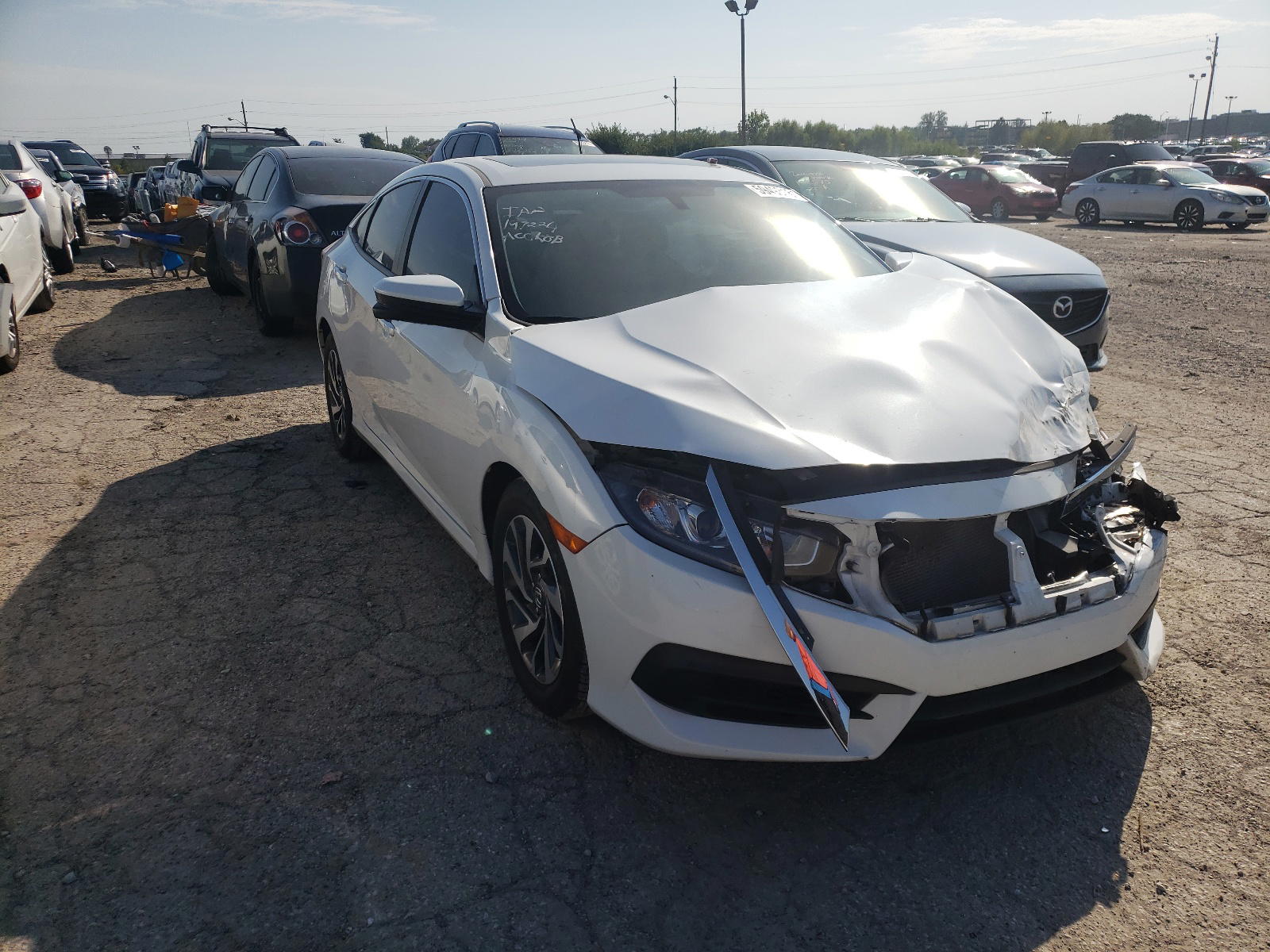 HONDA CIVIC EX 2017 with VIN 19XFC2F79HE004813 - Photo from auction