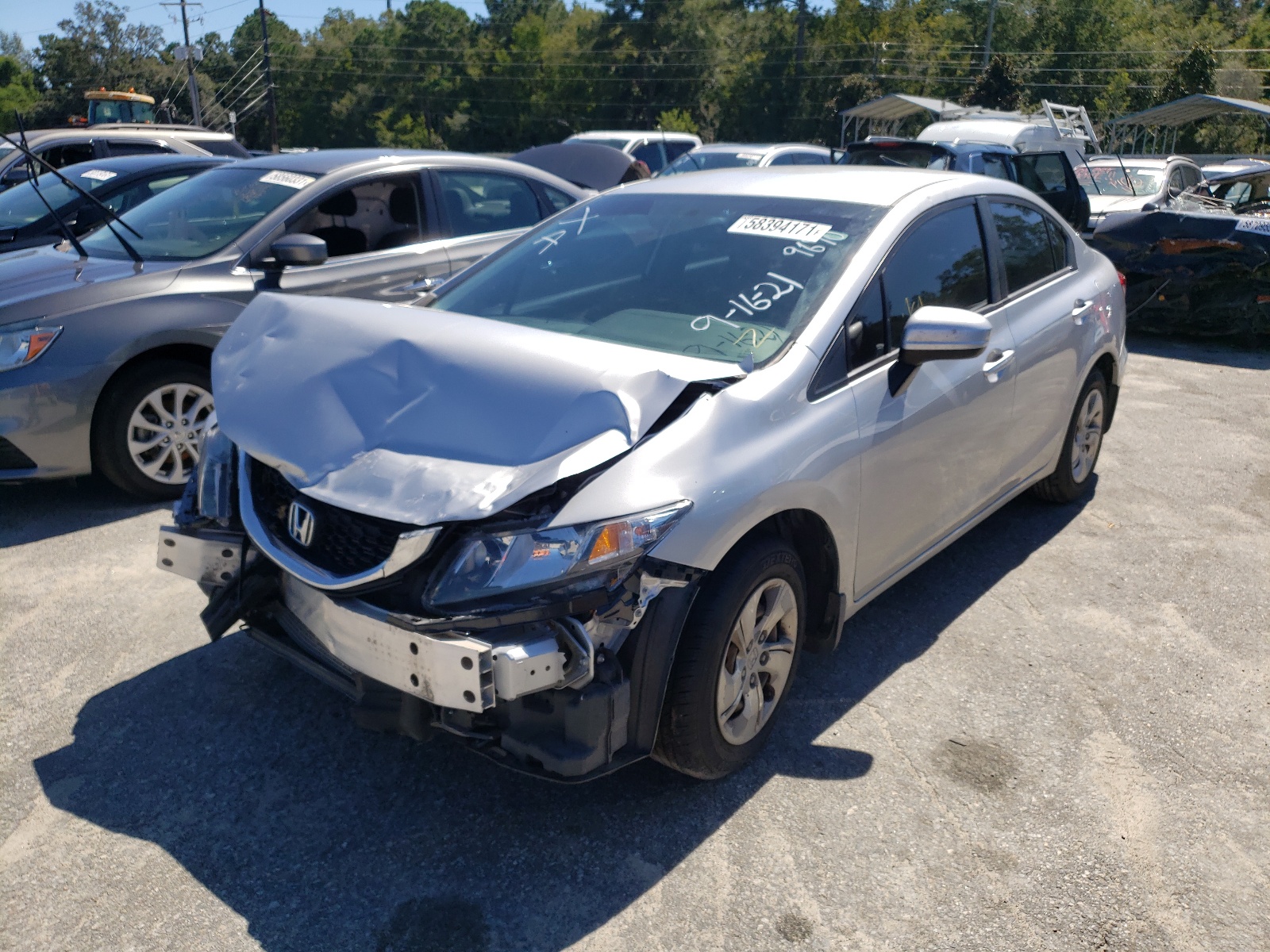 Photo 2 from auction – 2014 HONDA CIVIC LX with VIN 19XFB2F56EE049690