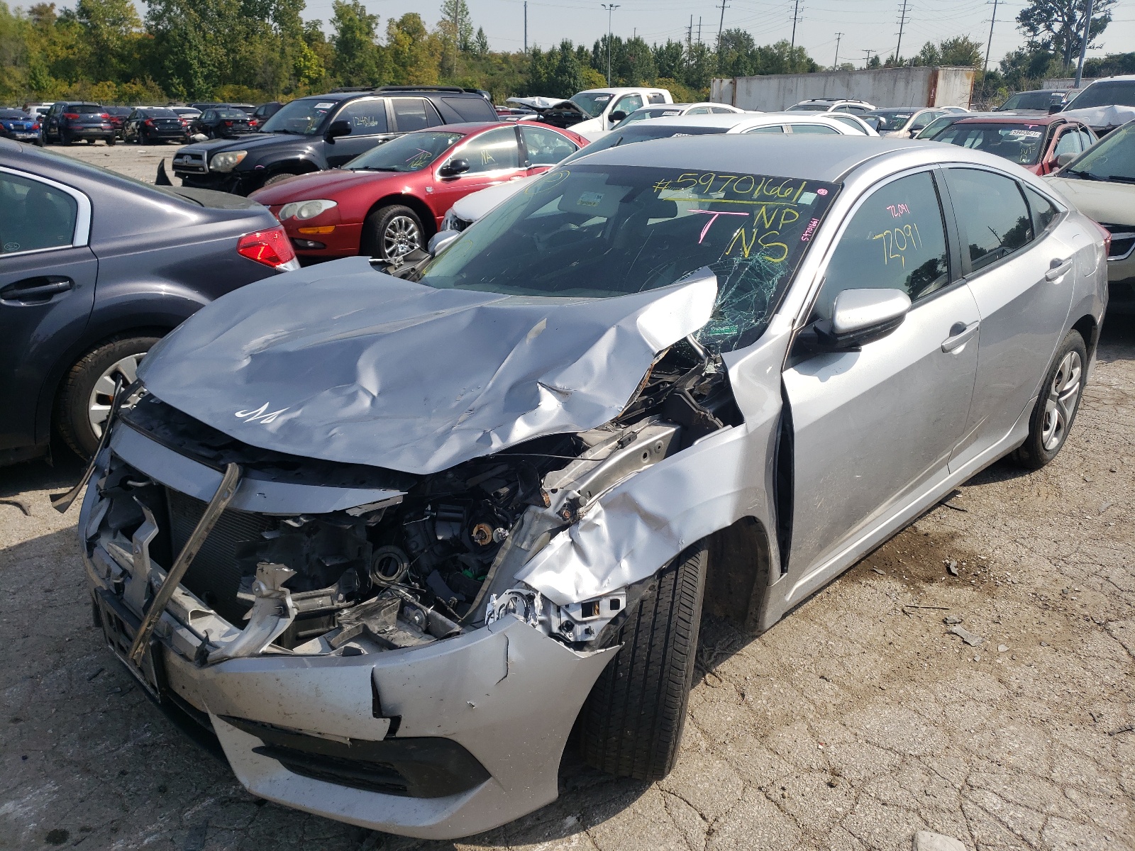 Photo 2 from auction – 2017 HONDA CIVIC LX with VIN 19XFC2F50HE015424