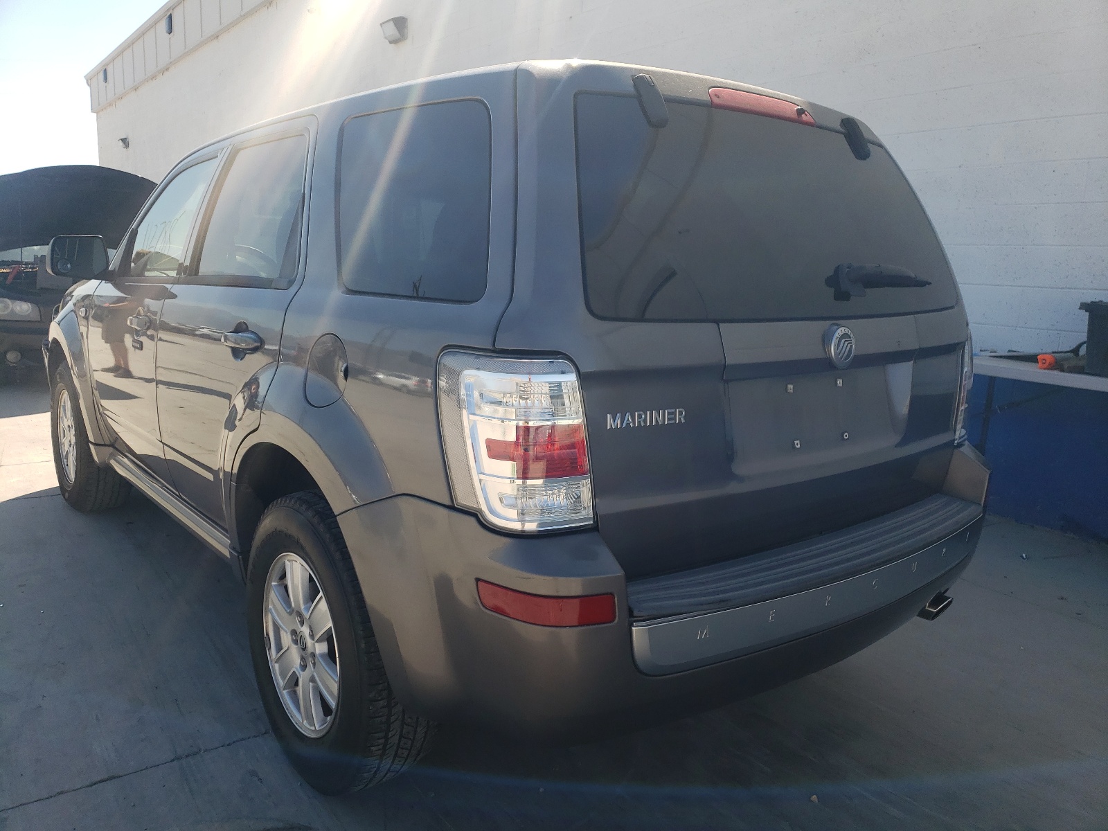 Photo 3 from auction – 2009 MERCURY MARINER with VIN 4M2CU81G89KJ19793