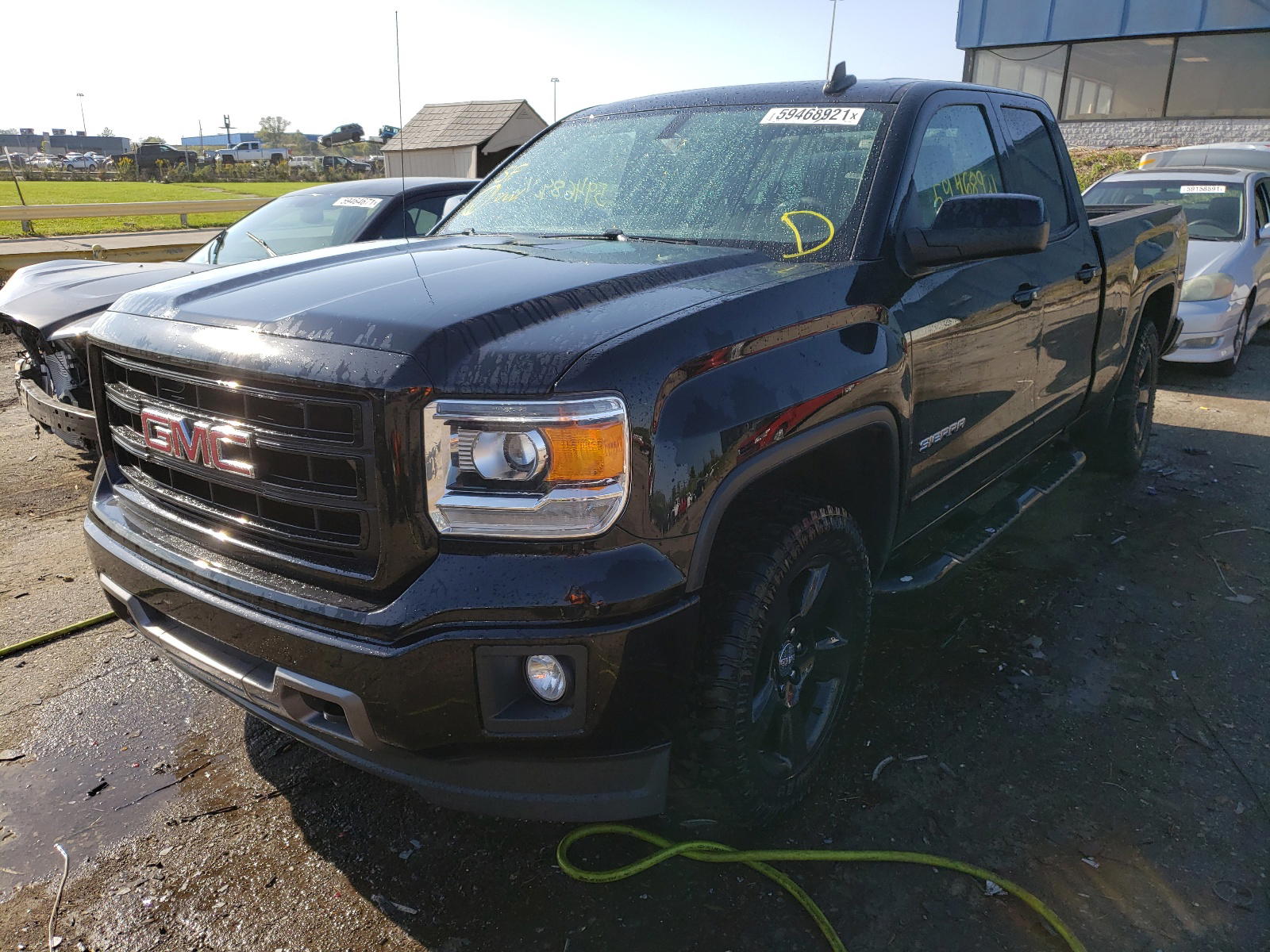 Photo 2 from auction – 2015 GMC SIERRA K15 with VIN 1GTV2TEC6FZ332663