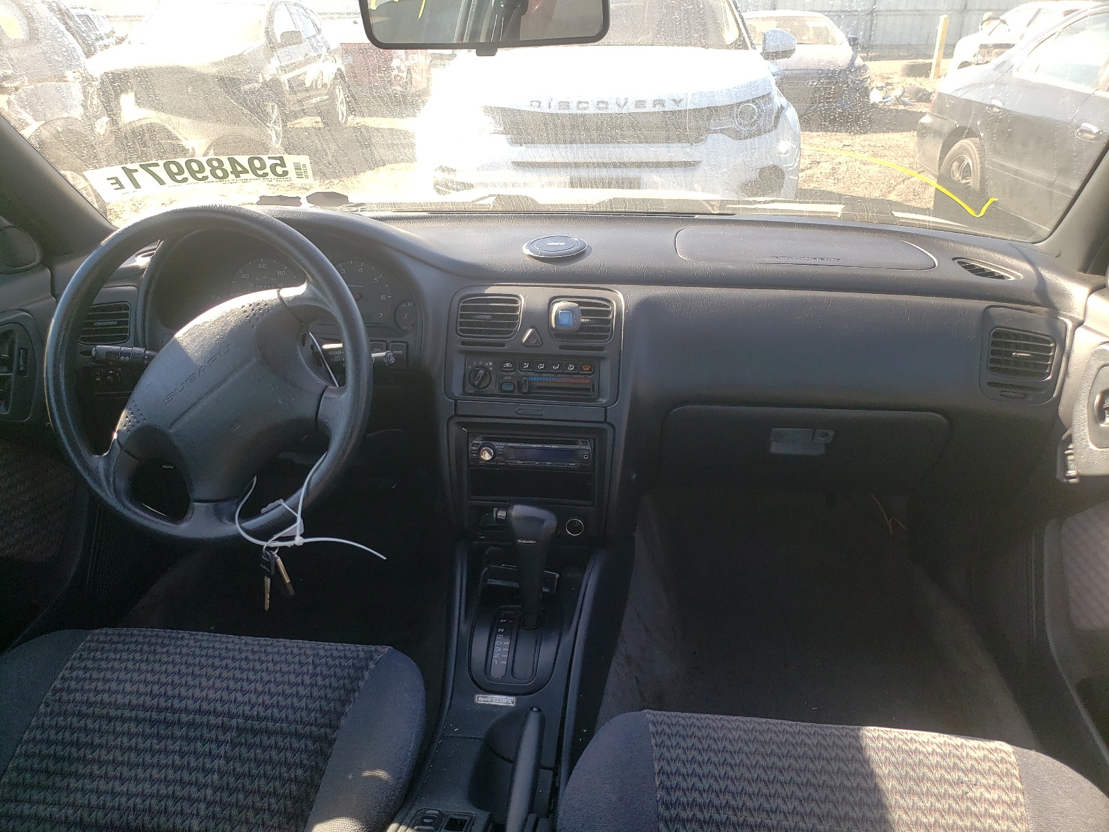 Photo 9 from auction – 1999 SUBARU LEGACY 30T with VIN 4S3BD6858X7240382