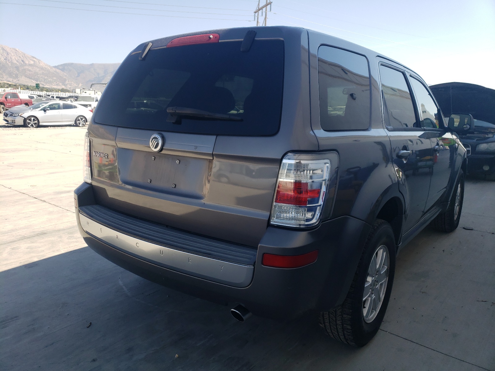 Photo 4 from auction – 2009 MERCURY MARINER with VIN 4M2CU81G89KJ19793