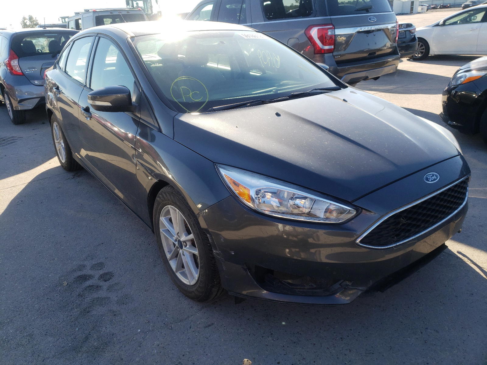 FORD FOCUS SE 2017 with VIN 1FADP3F23HL317326 - Photo from auction