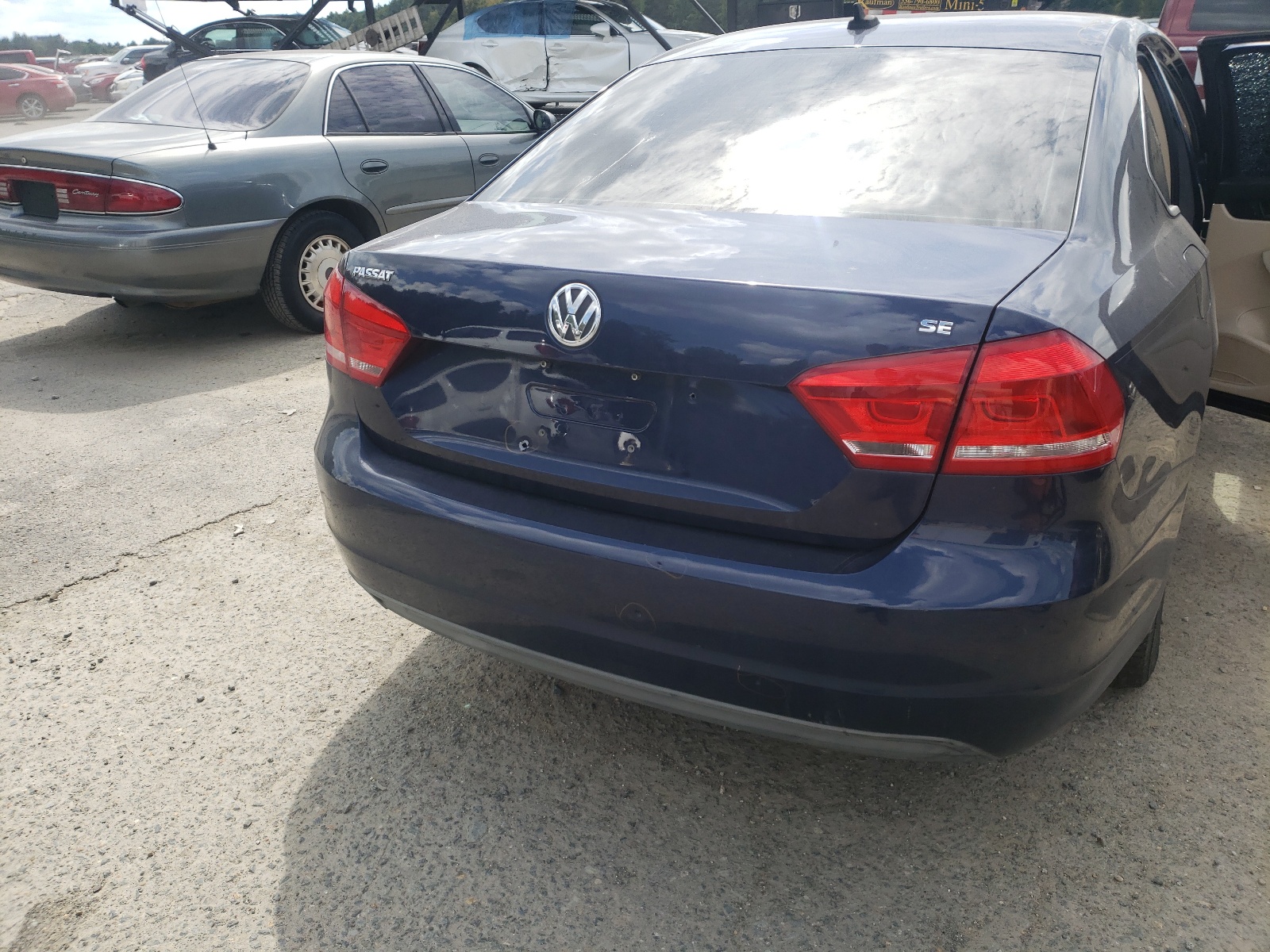 Photo 9 from auction – 2013 VOLKSWAGEN PASSAT SE with VIN 1VWBH7A33DC079796