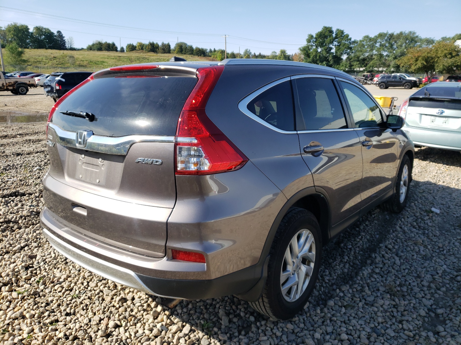 Photo 4 from auction – 2016 HONDA CR-V EXL with VIN 5J6RM4H7XGL055482
