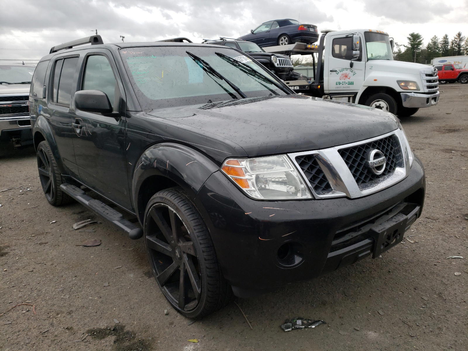 NISSAN PATHFINDER 2011 with VIN 5N1AR1NB7BC620559 - Photo from auction