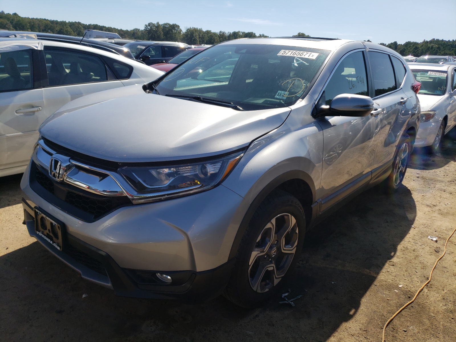 Photo 2 from auction – 2018 HONDA CR-V EX with VIN 7FARW2H56JE033979
