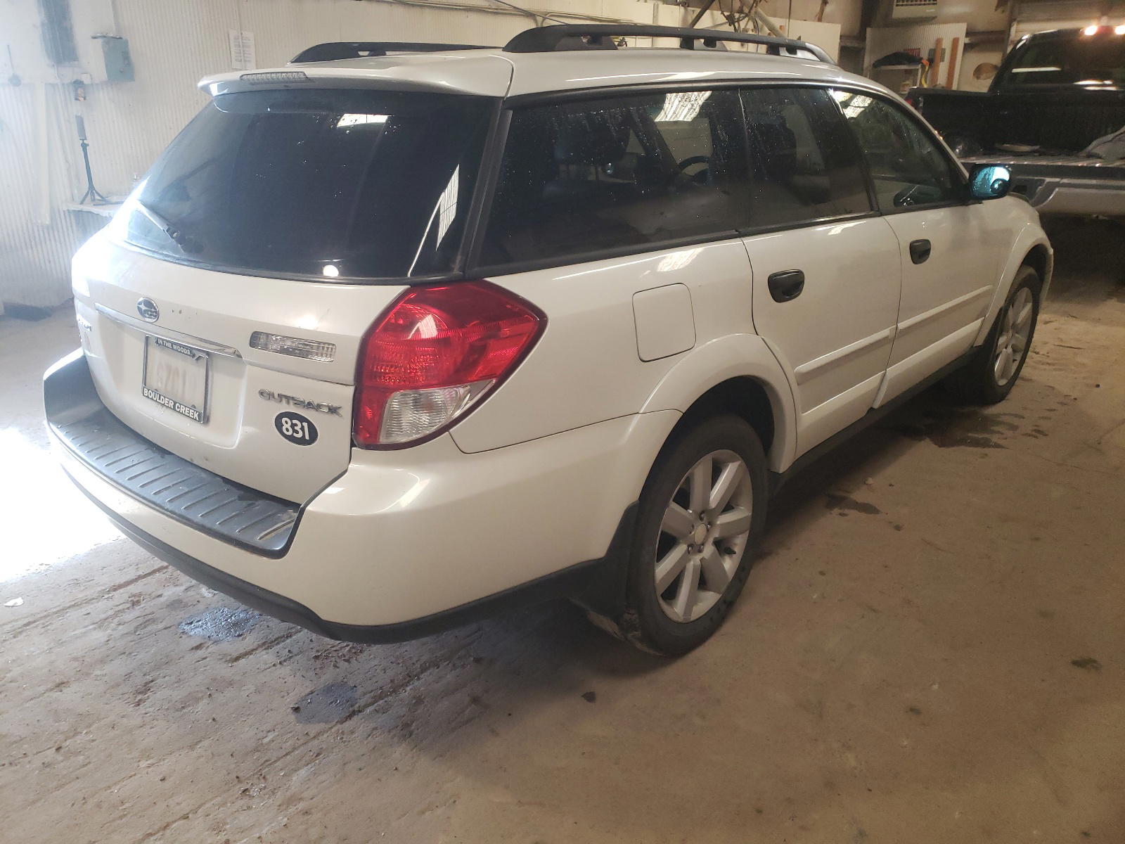 Photo 4 from auction – 2009 SUBARU OUTBACK 2. with VIN 4S4BP61C597347663