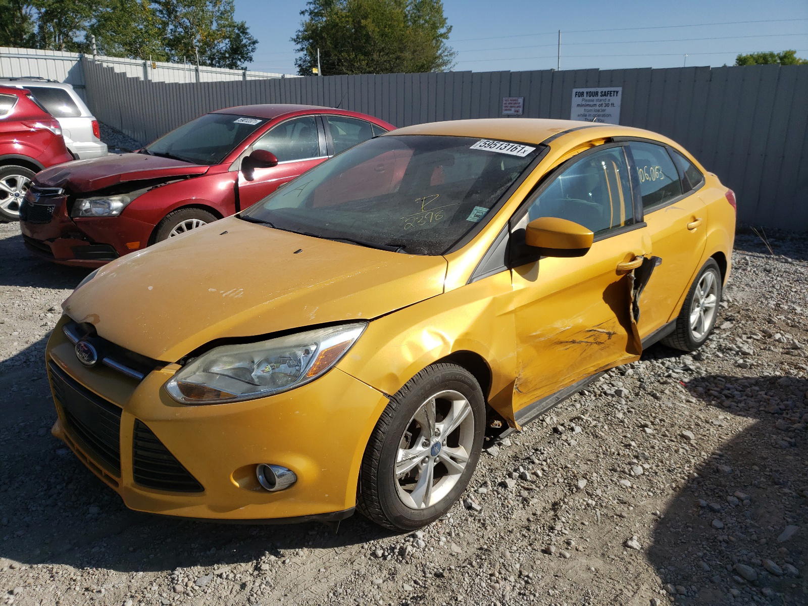 Photo 2 from auction – 2012 FORD FOCUS SE with VIN 1FAHP3F21CL262398