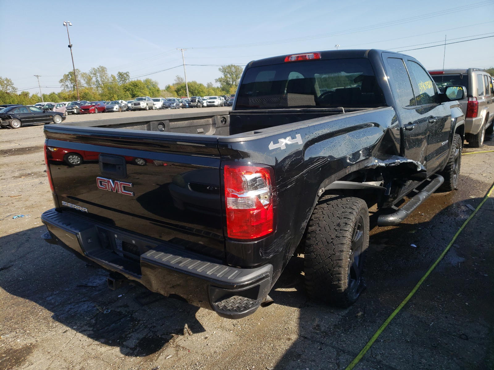 Photo 4 from auction – 2015 GMC SIERRA K15 with VIN 1GTV2TEC6FZ332663