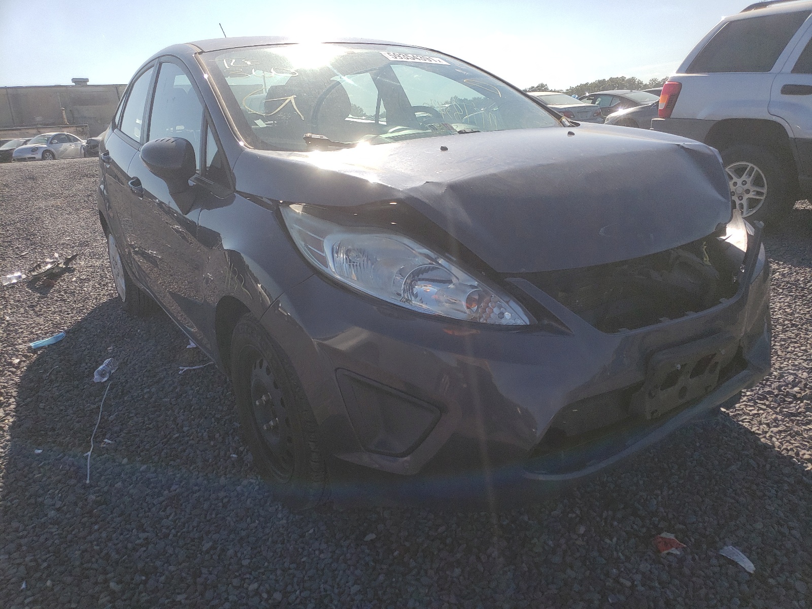 FORD FIESTA SE 2013 with VIN 3FADP4BJ3DM146198 - Photo from auction