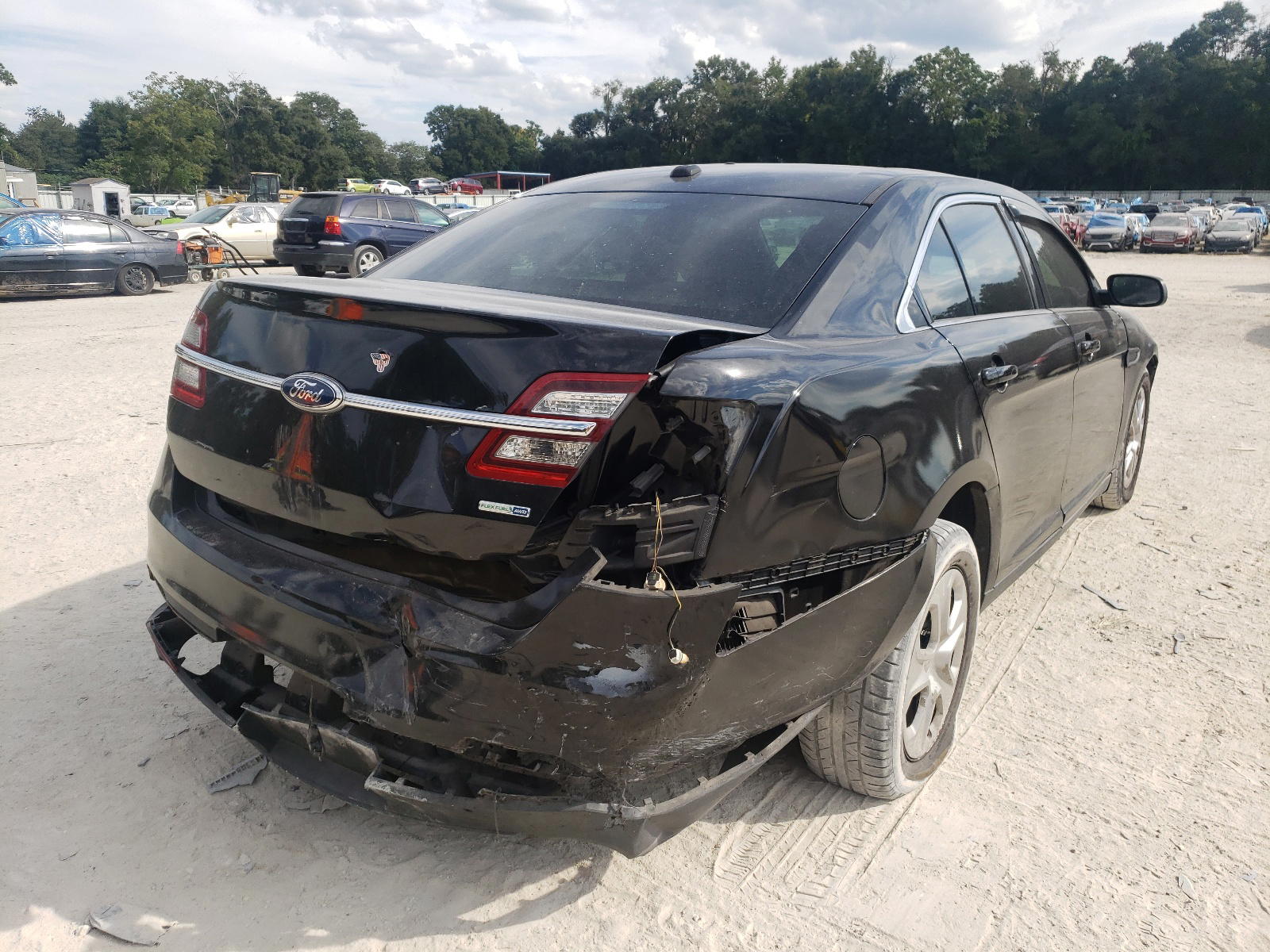 Photo 4 from auction – 2013 FORD TAURUS POL with VIN 1FAHP2M85DG110474
