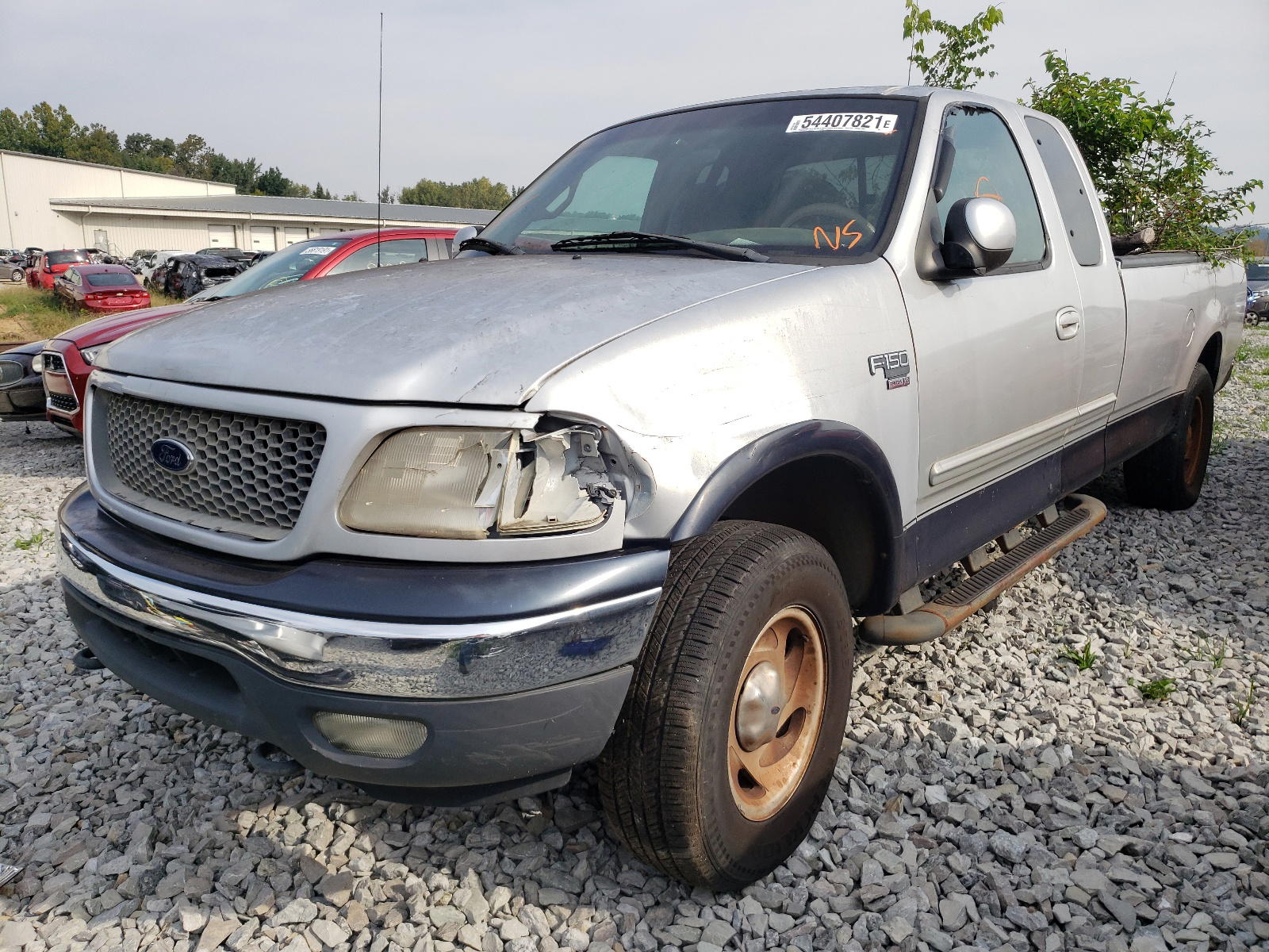 Photo 2 from auction – 2000 FORD F-150 with VIN 1FTRX18LXYNA91073