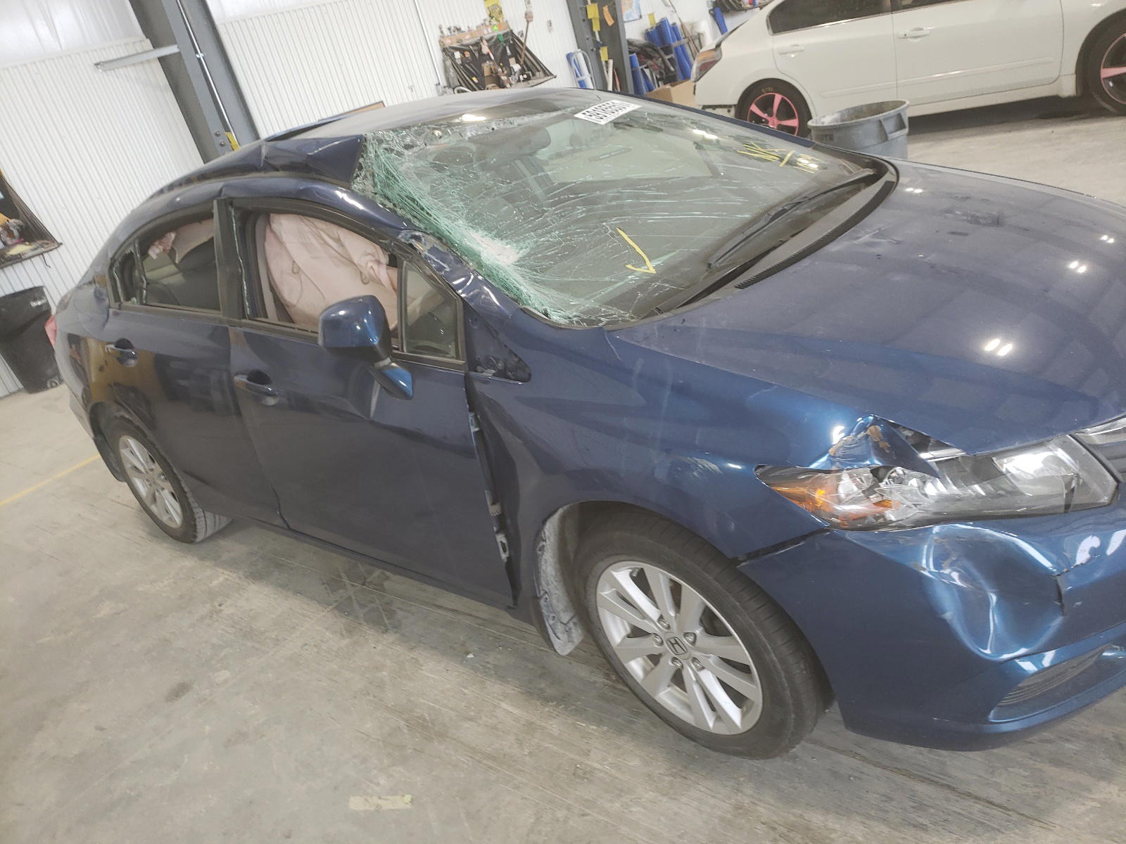 Photo 9 from auction – 2012 HONDA CIVIC EX with VIN 2HGFB2F88CH511079