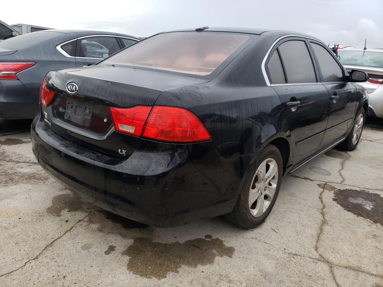 Photo 4 from auction – 2009 KIA OPTIMA LX with VIN KNAGE228295308945