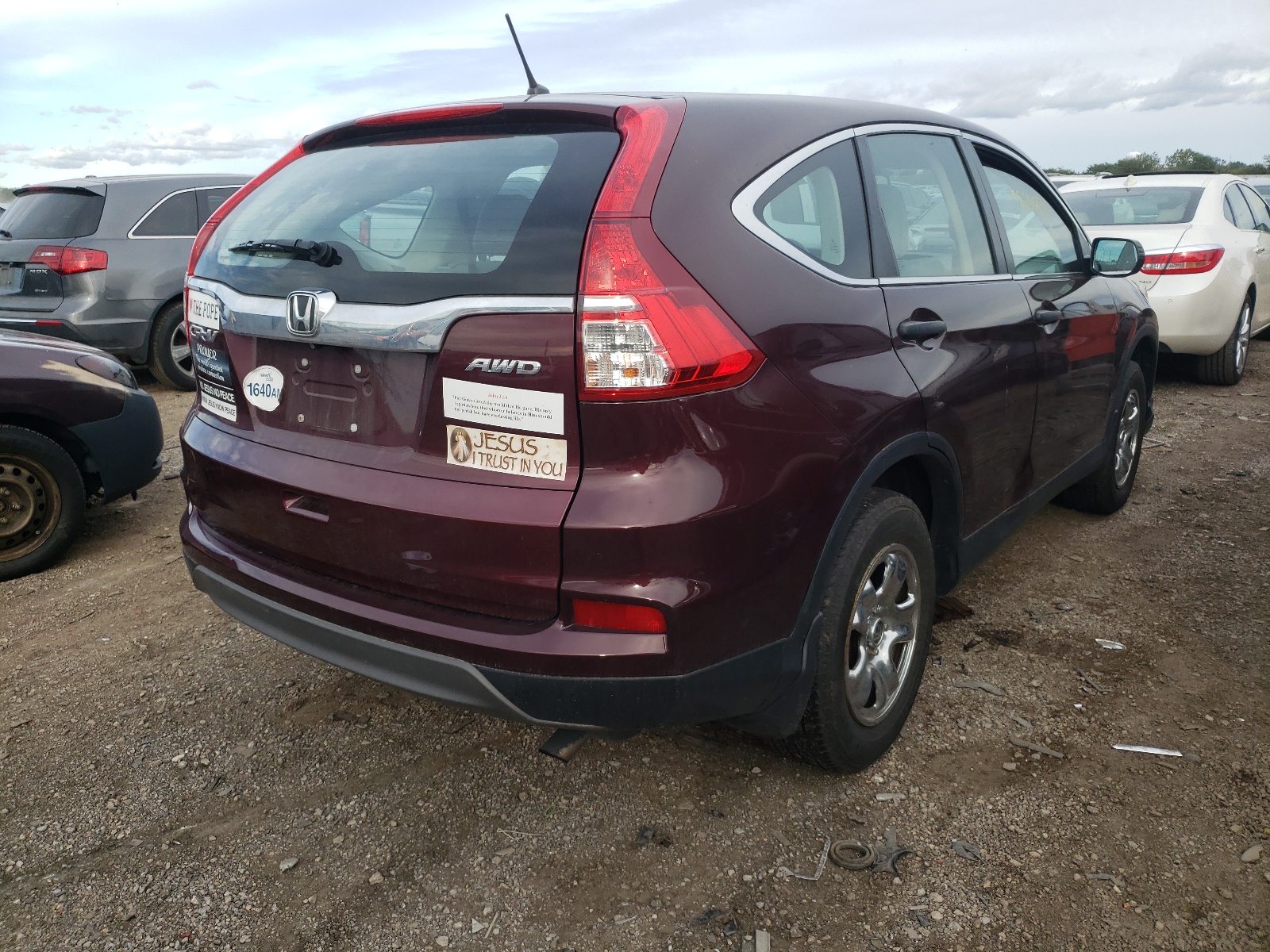 Photo 4 from auction – 2015 HONDA CR-V LX with VIN 5J6RM4H33FL046053