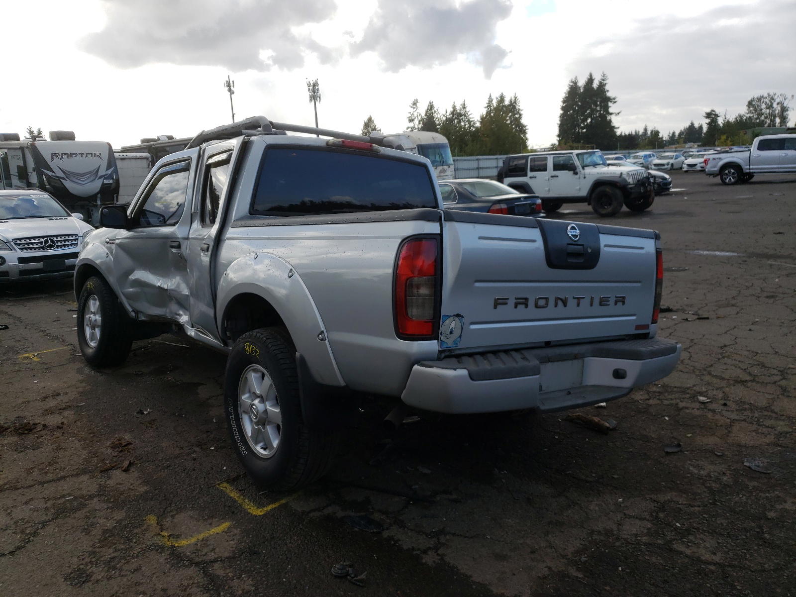 Photo 3 from auction – 2003 NISSAN FRONTIER with VIN 1N6MD27Y23C418783