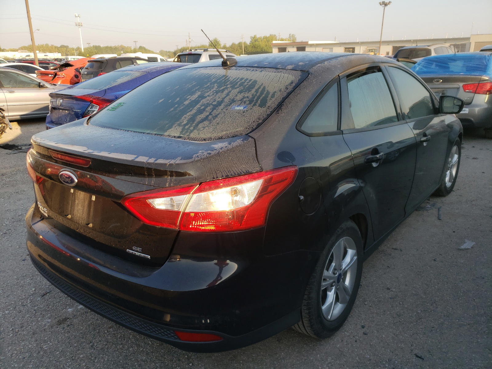 Photo 4 from auction – 2014 FORD FOCUS SE with VIN 1FADP3F27EL249513