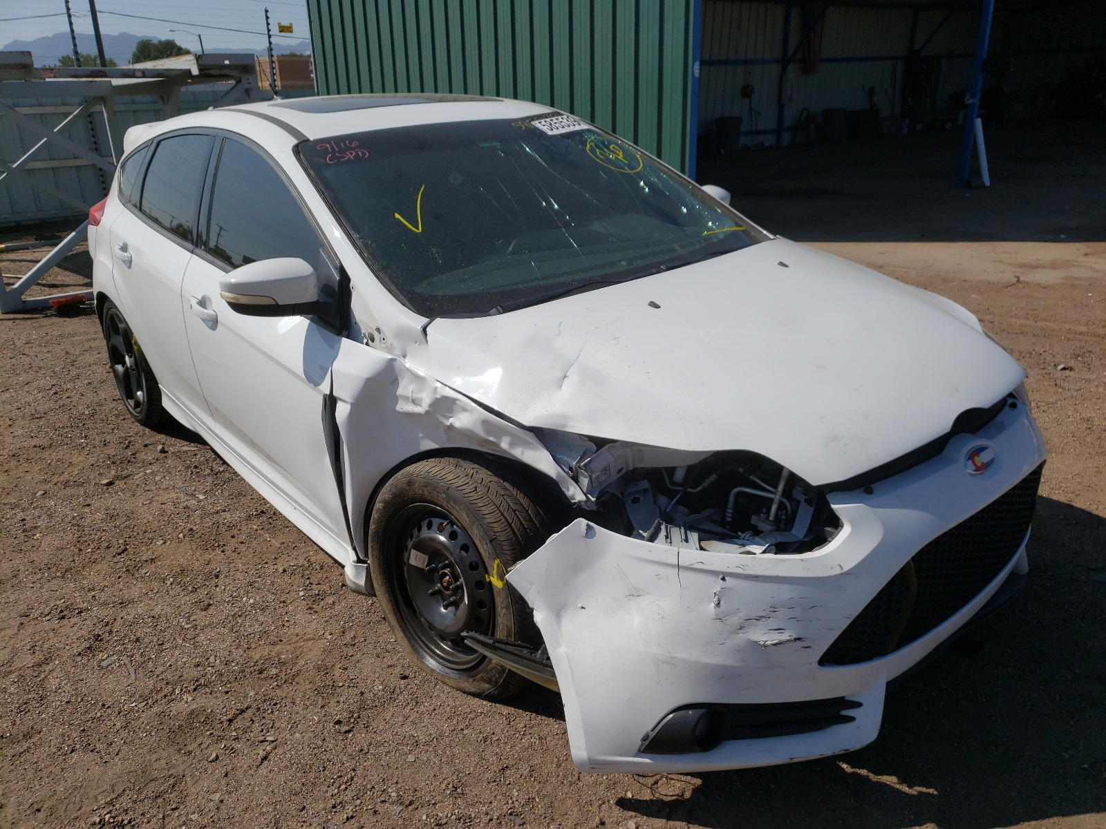 FORD FOCUS ST 2014 with VIN 1FADP3L97EL212463 - Photo from auction