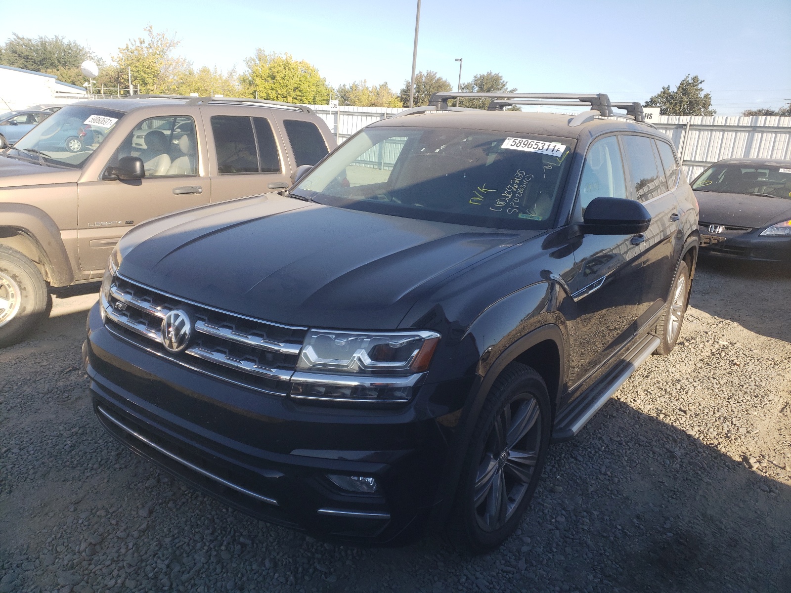 Photo 2 from auction – 2018 VOLKSWAGEN ATLAS SEL with VIN 1V2RR2CA5JC562035