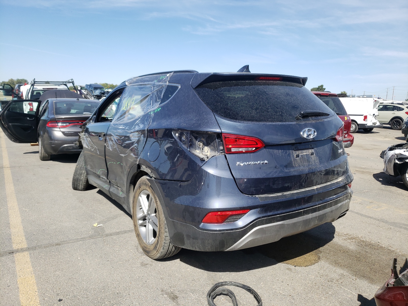 Photo 3 from auction – 2017 HYUNDAI SANTA FE S with VIN 5NMZU3LB7HH015312