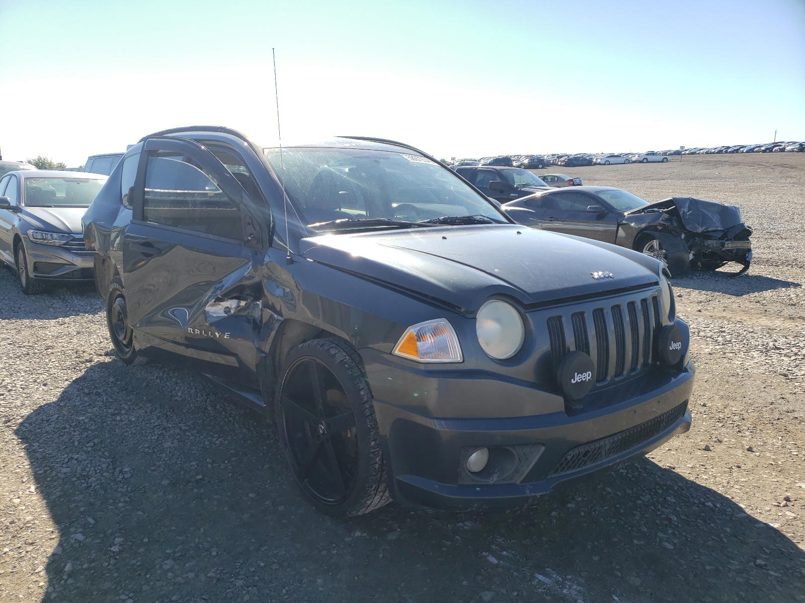 JEEP COMPASS 2007 with VIN 1J8FT47W67D371033 - Photo from auction
