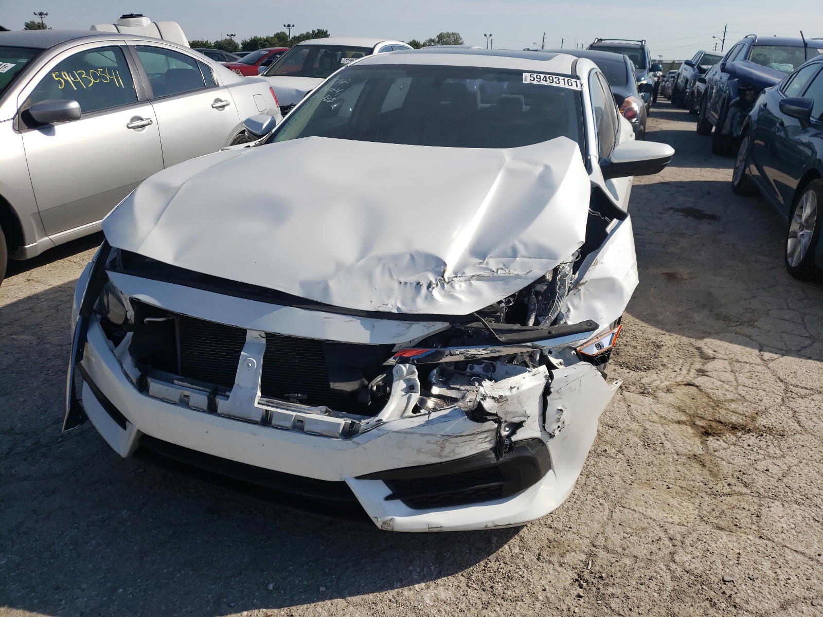Photo 9 from auction – 2017 HONDA CIVIC EX with VIN 19XFC2F79HE004813