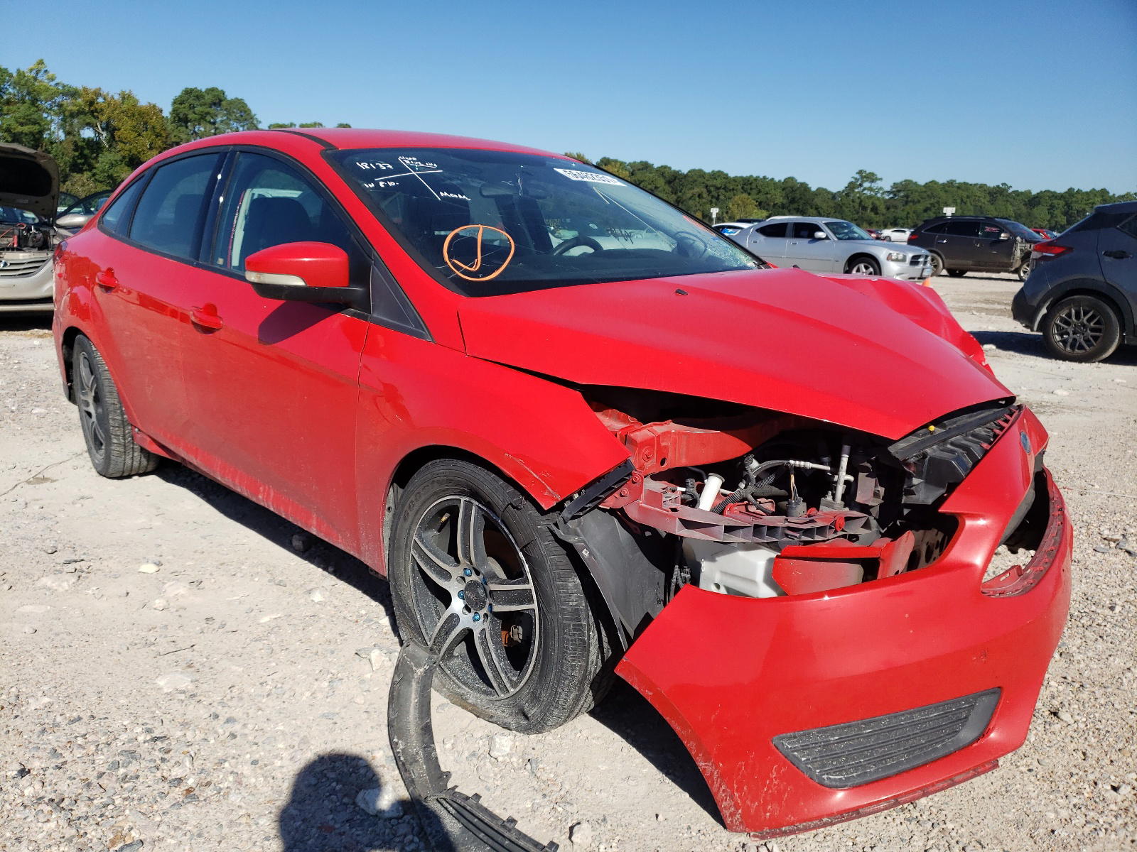 FORD FOCUS SE 2015 with VIN 1FADP3F23FL240342 - Photo from auction