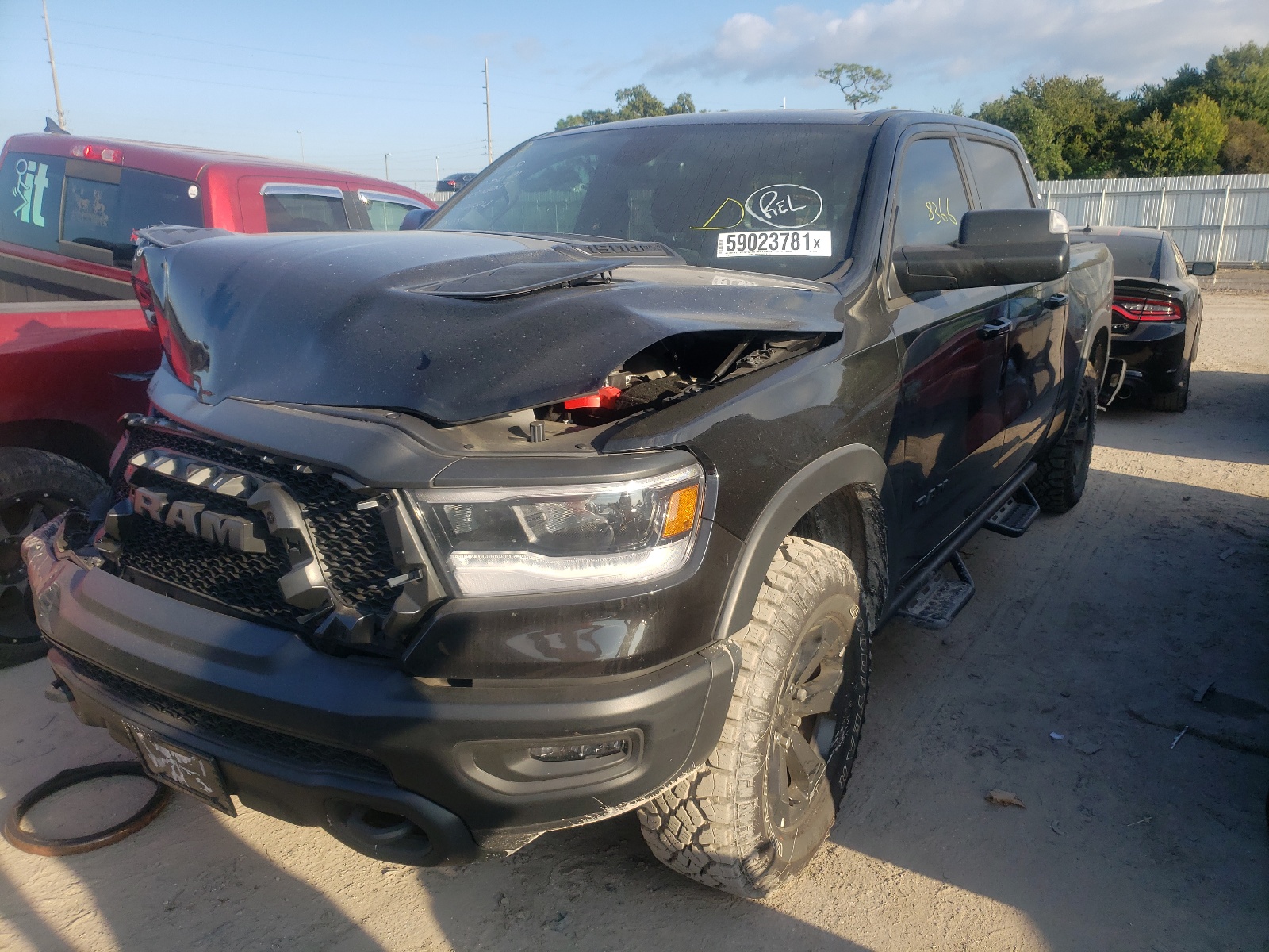 Photo 2 from auction – 2020 RAM 1500 REBEL with VIN 1C6SRFLT0LN422887