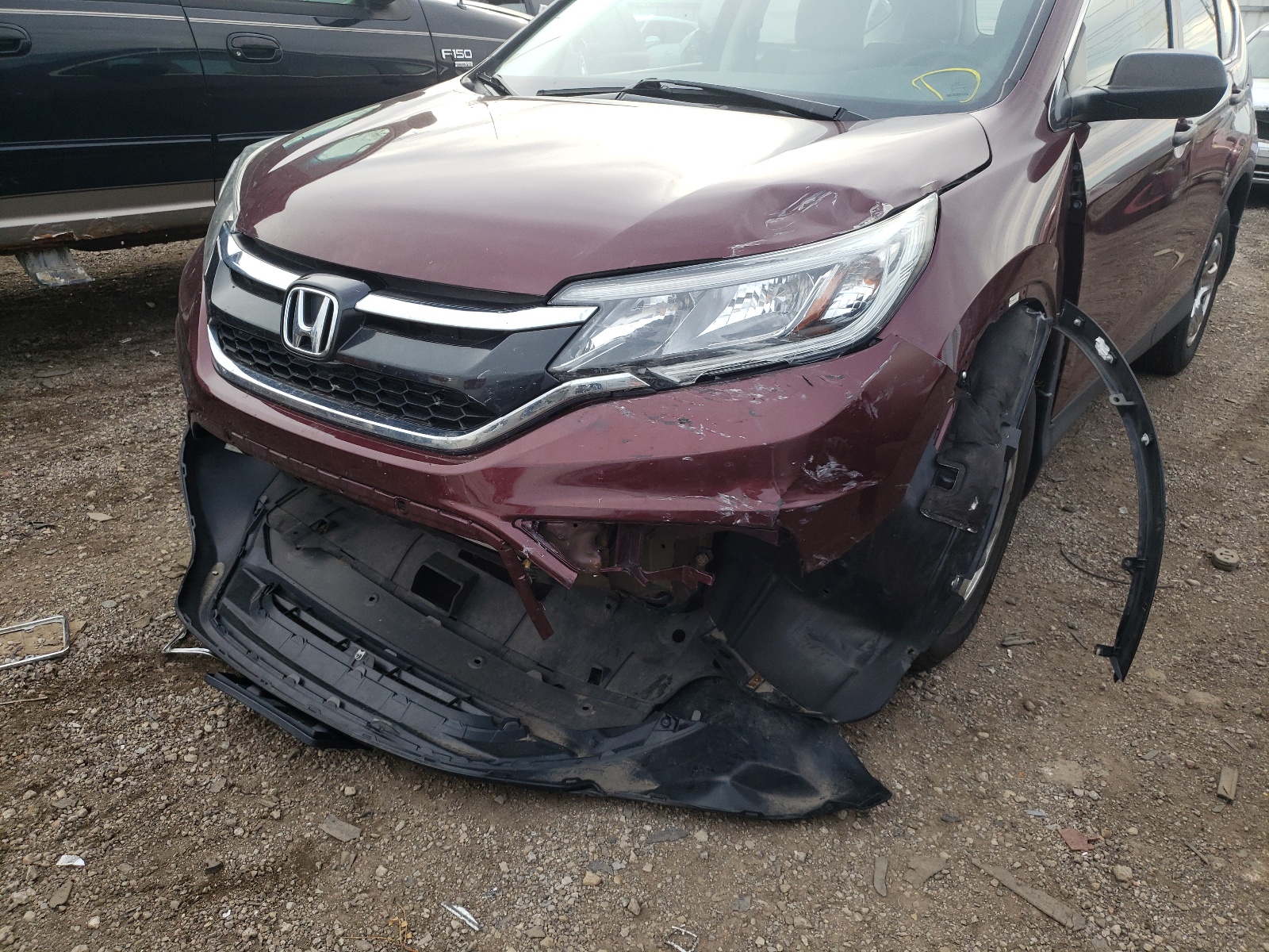 Photo 9 from auction – 2015 HONDA CR-V LX with VIN 5J6RM4H33FL046053