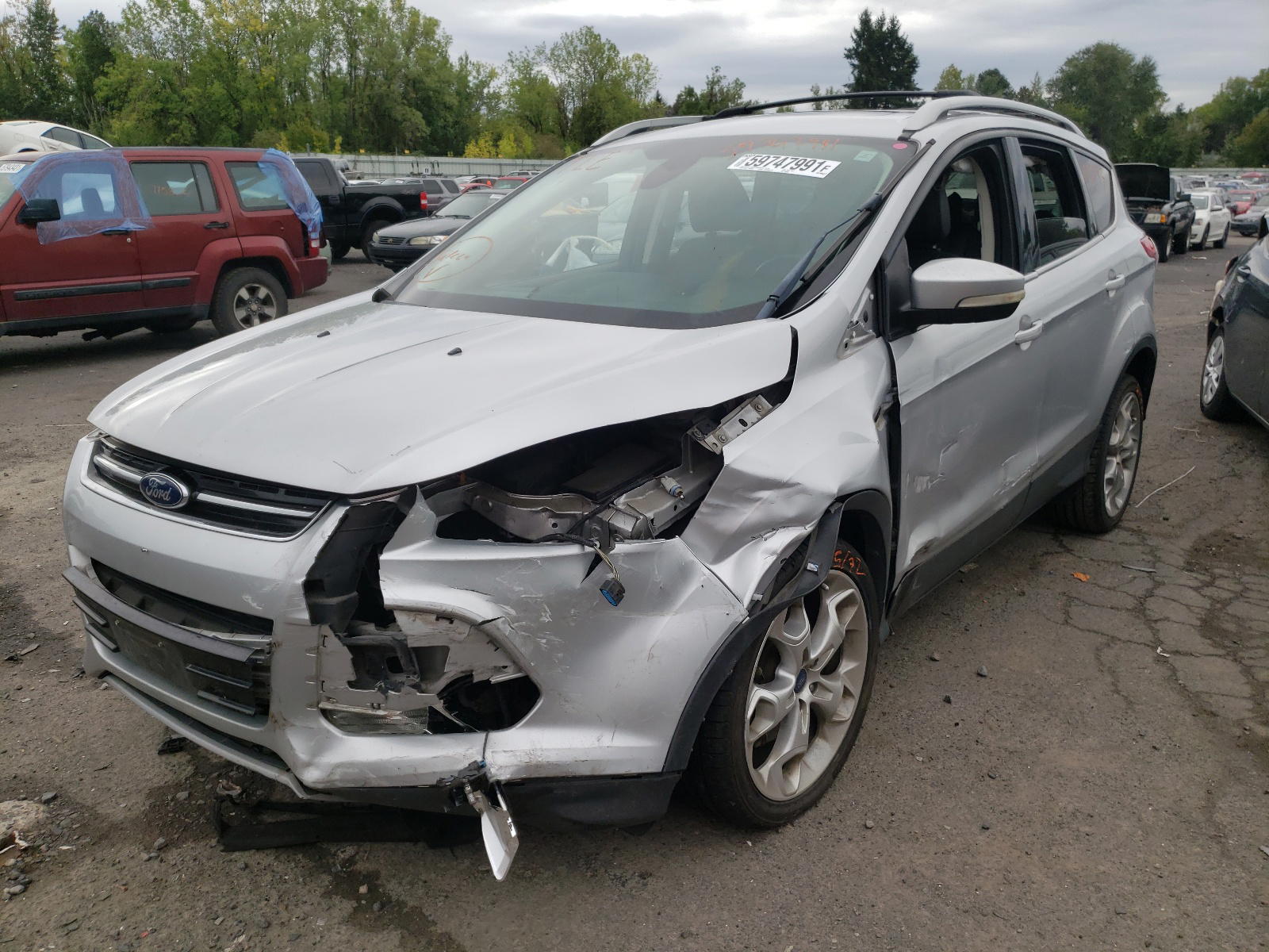 Photo 2 from auction – 2013 FORD ESCAPE TIT with VIN 1FMCU9J94DUC86898