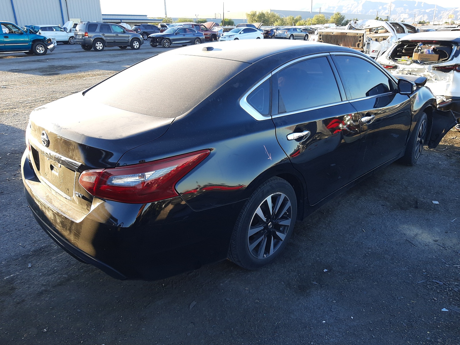Photo 4 from auction – 2018 NISSAN ALTIMA 2.5 with VIN 1N4AL3AP2JC150822
