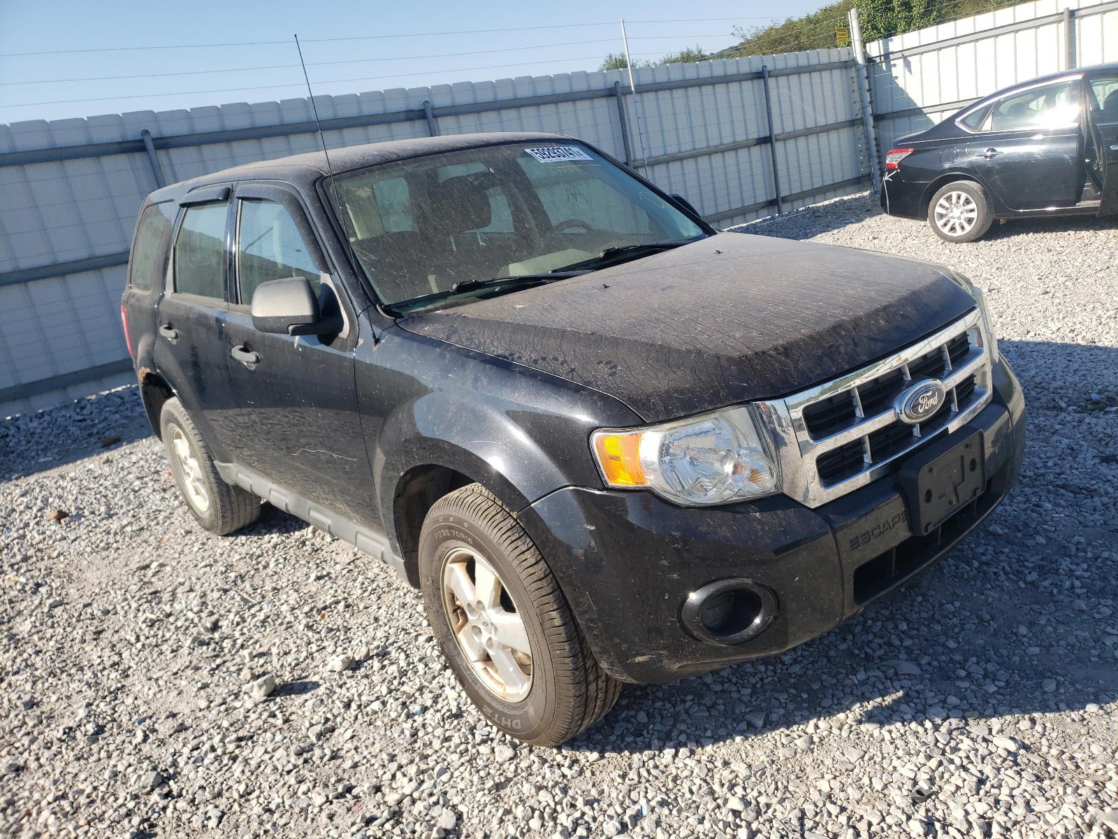 FORD ESCAPE XLS 2011 with VIN 1FMCU0C74BKA05506 - Photo from auction