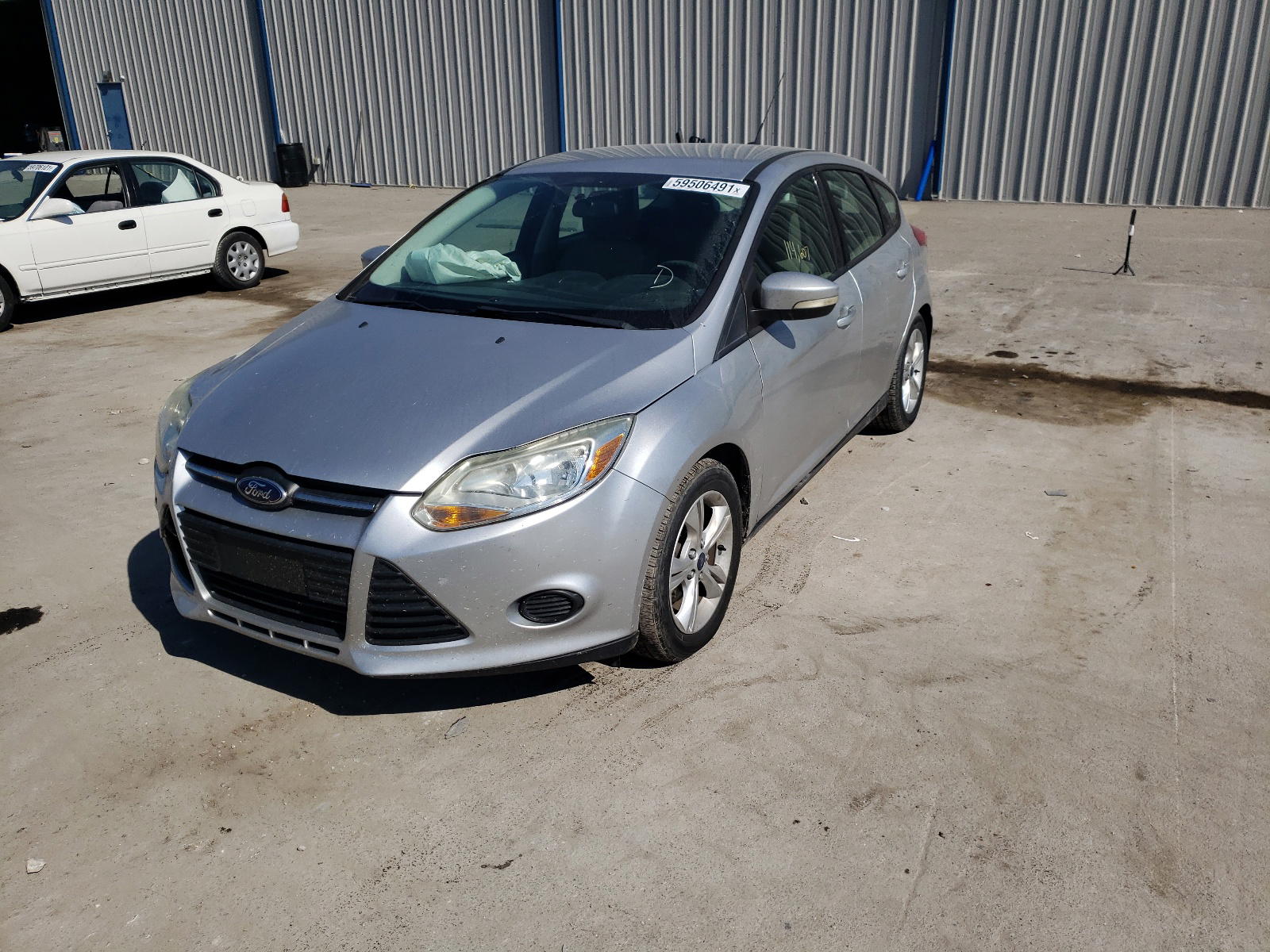 Photo 2 from auction – 2013 FORD FOCUS SE with VIN 1FADP3K27DL240976