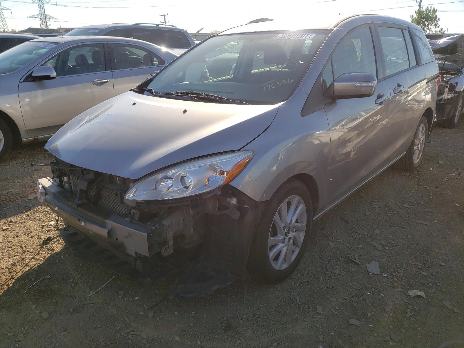 Photo 2 from auction – 2014 MAZDA 5 SPORT with VIN JM1CW2BL4E0176586