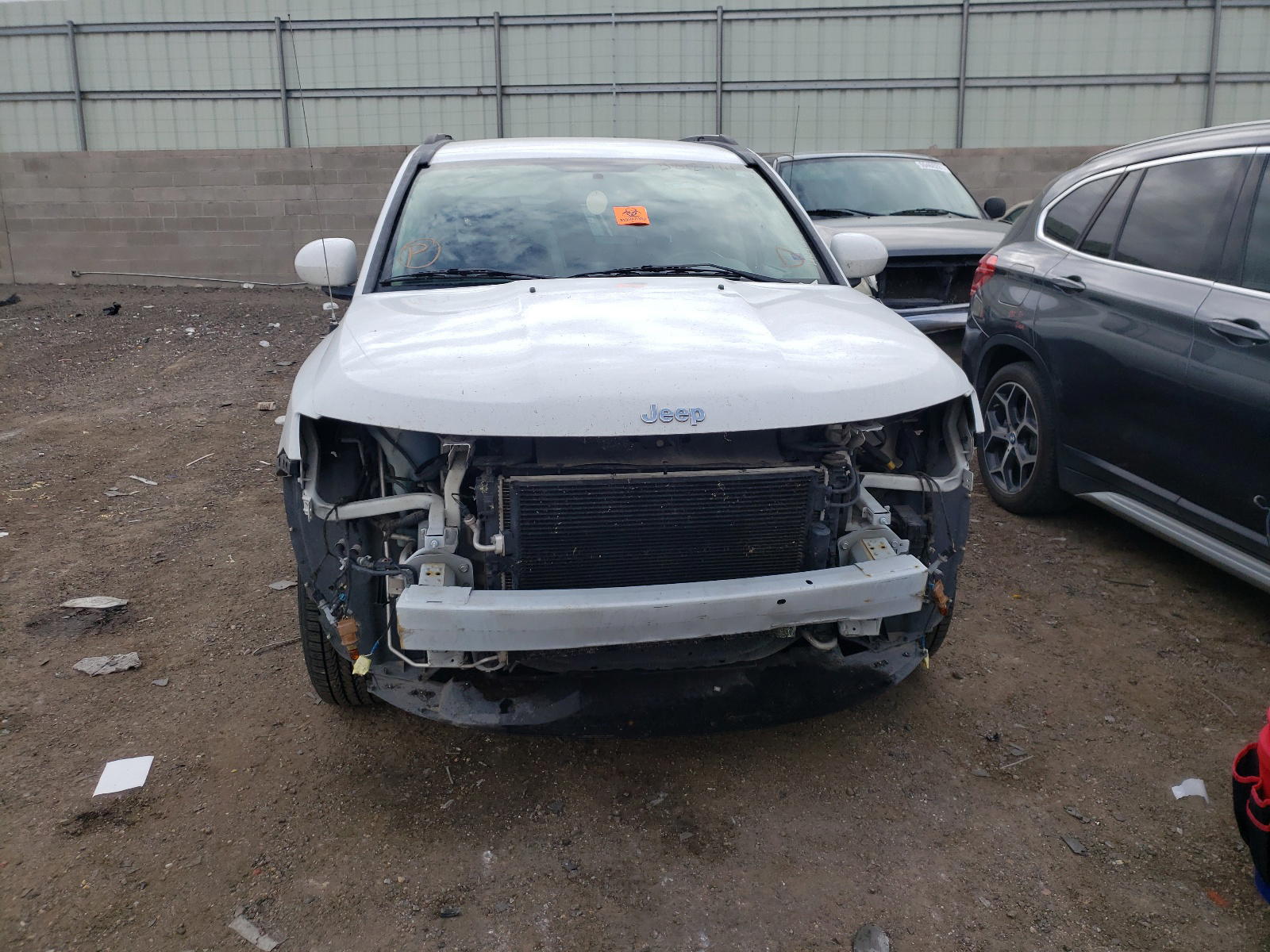 Photo 9 from auction – 2016 JEEP COMPASS LA with VIN 1C4NJCEA8GD620104