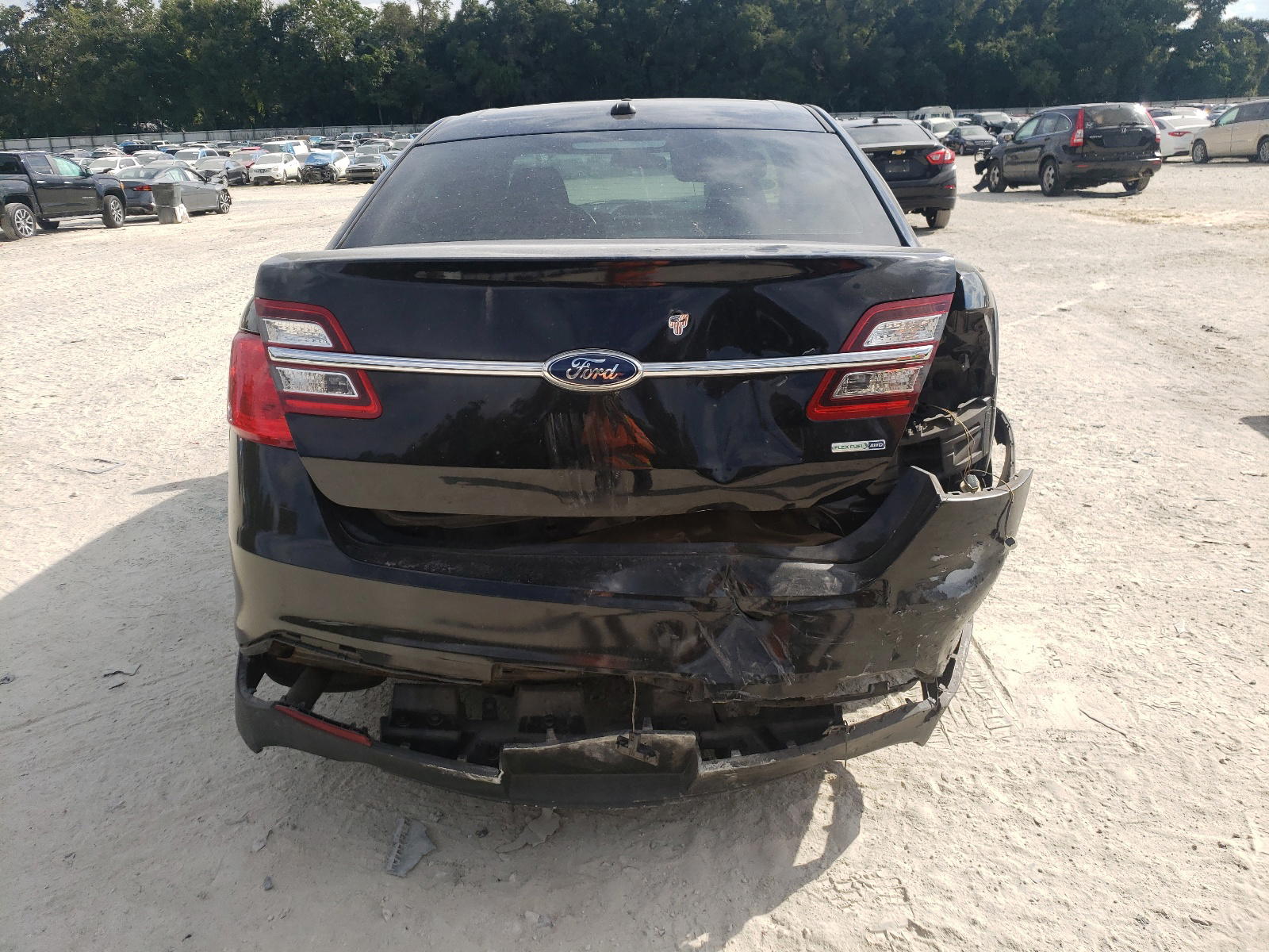 Photo 9 from auction – 2013 FORD TAURUS POL with VIN 1FAHP2M85DG110474