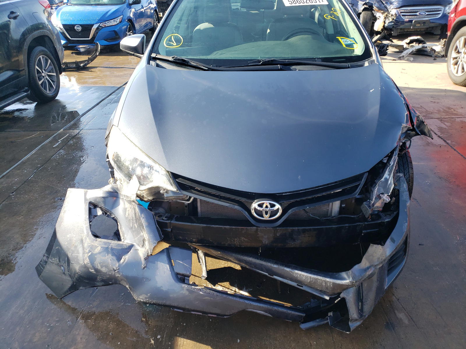Photo 9 from auction – 2014 TOYOTA COROLLA EC with VIN 5YFBPRHE6EP119189