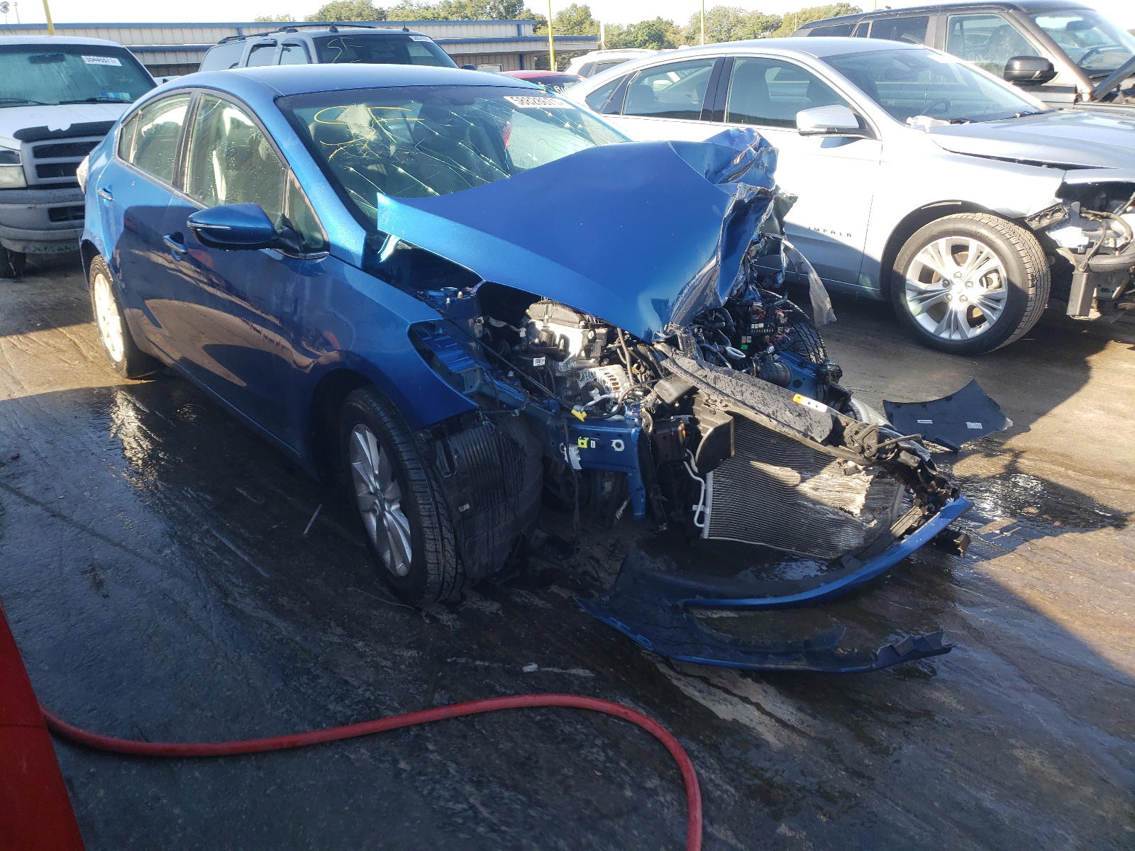 KIA FORTE EX 2014 with VIN KNAFX4A87E5160076 - Photo from auction