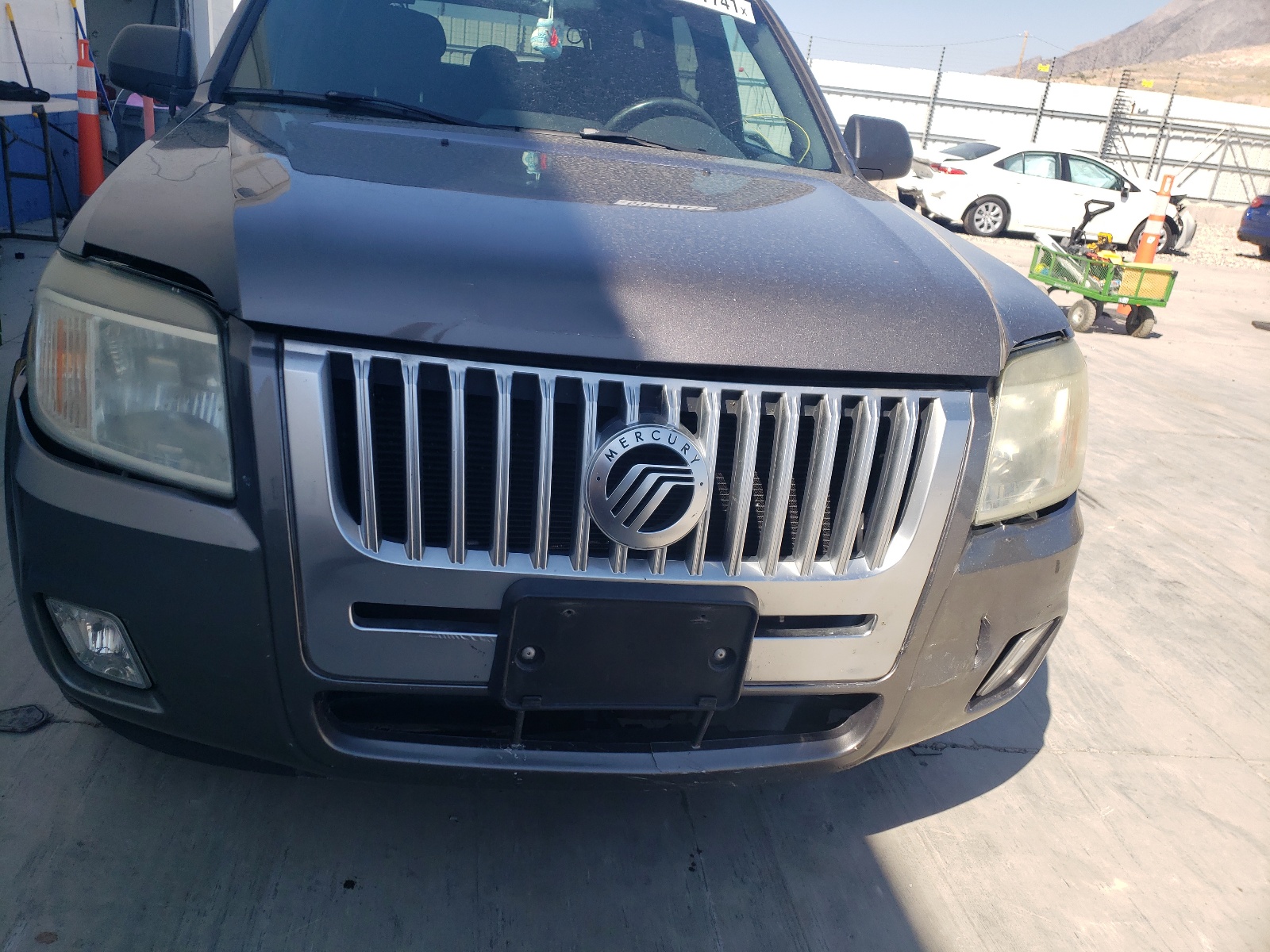 Photo 9 from auction – 2009 MERCURY MARINER with VIN 4M2CU81G89KJ19793