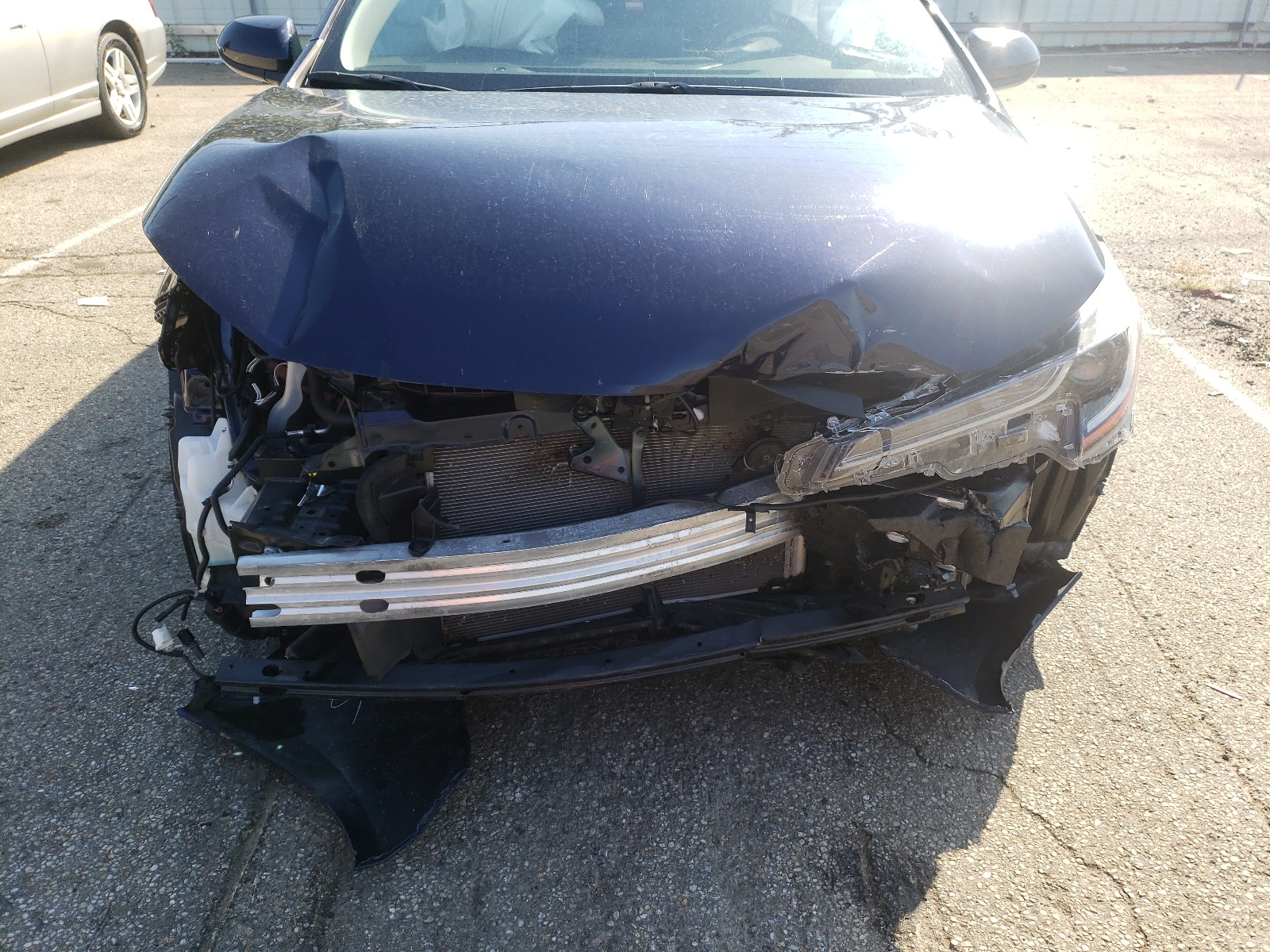 Photo 7 from auction – 2021 TOYOTA COROLLA LE with VIN JTDEPMAE4MJ141365