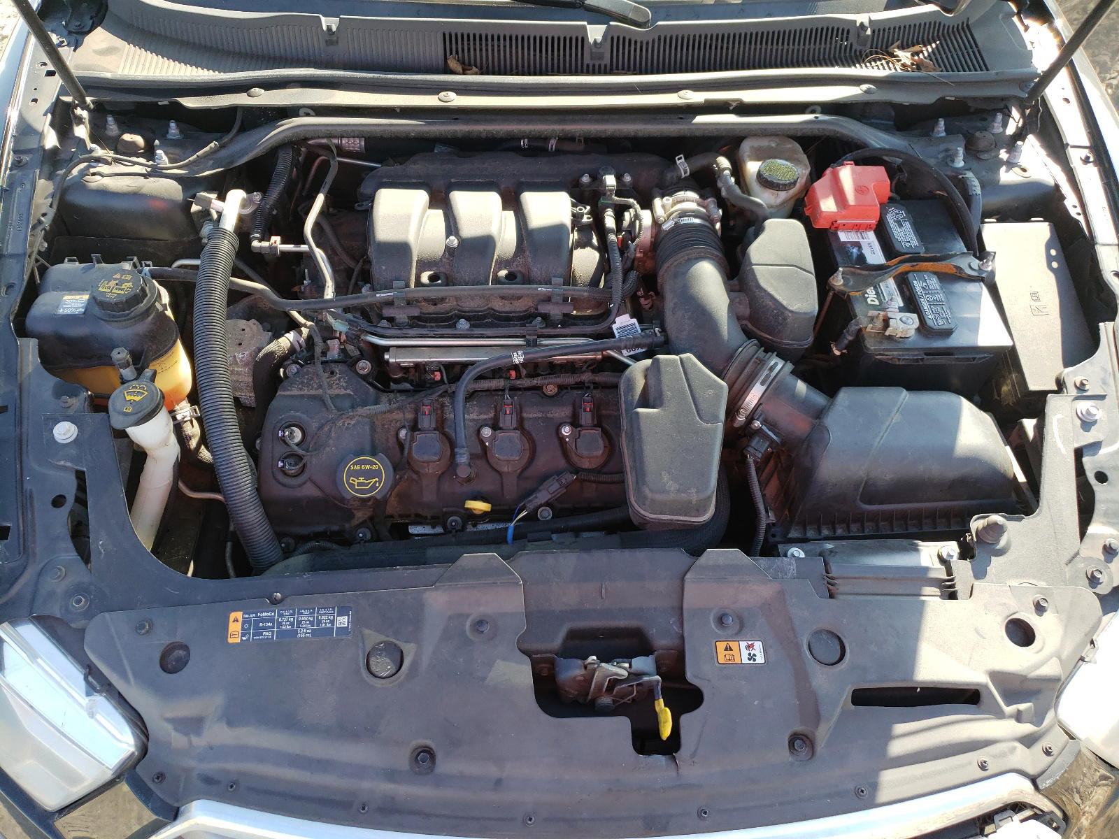 Photo 7 from auction – 2015 FORD TAURUS SEL with VIN 1FAHP2H86FG170485