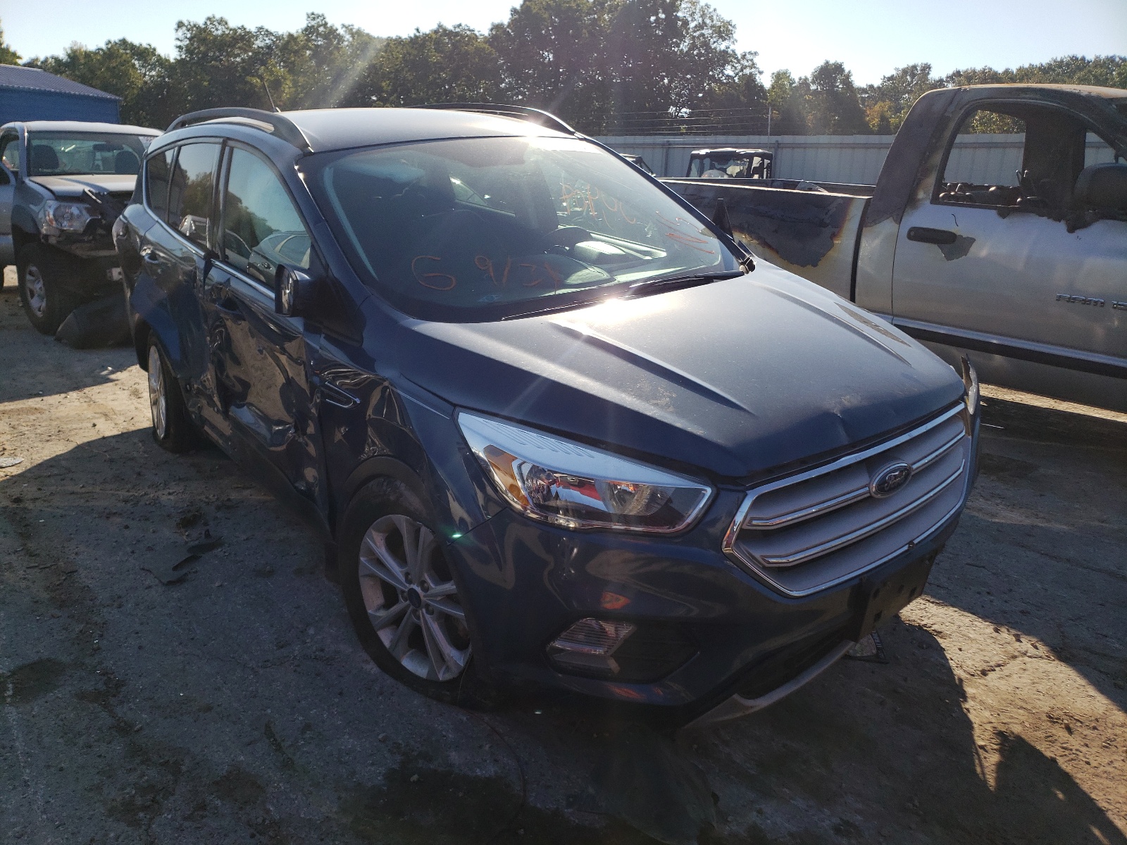 Photo 1 from auction – 2018 FORD ESCAPE SE with VIN 1FMCU9GD9JUA64168