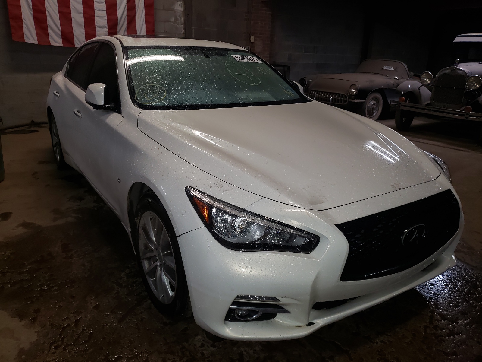 Photo 1 from auction – 2015 INFINITI Q50 BASE with VIN JN1BV7AR0FM418045