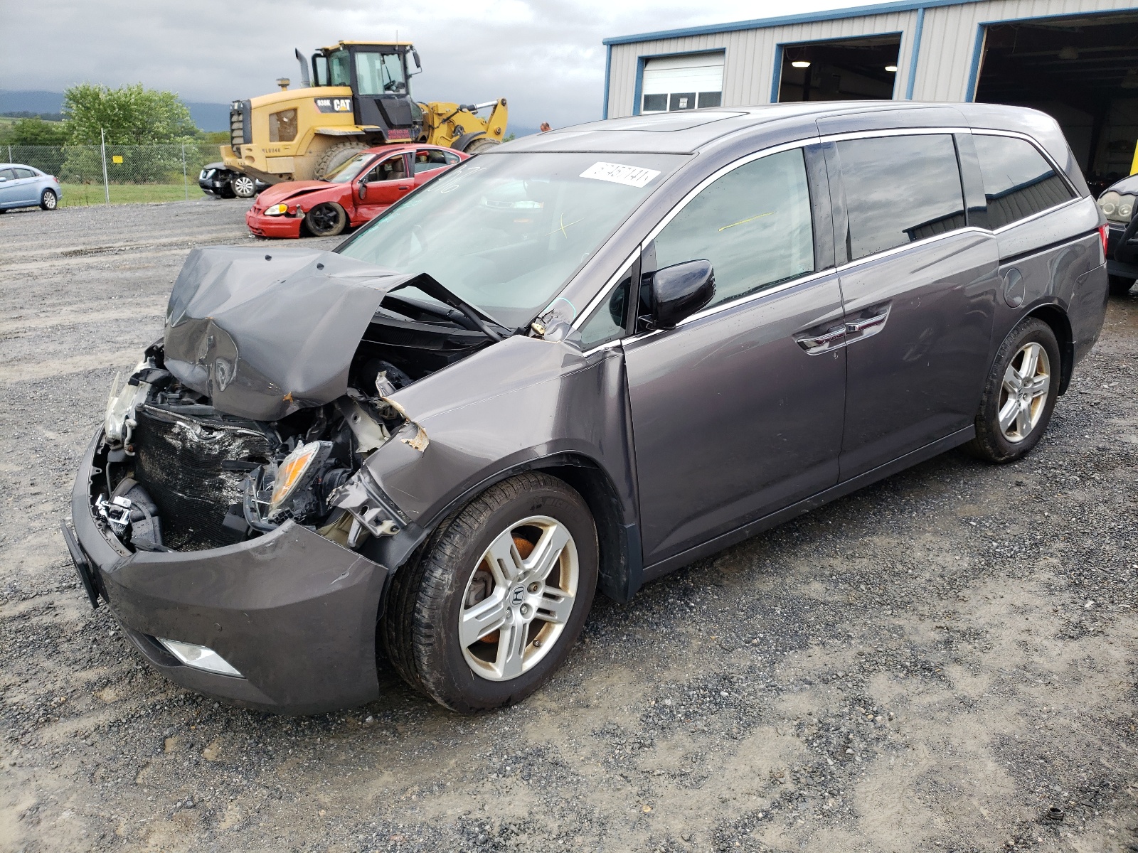 Photo 2 from auction – 2012 HONDA ODYSSEY TO with VIN 5FNRL5H97CB048549