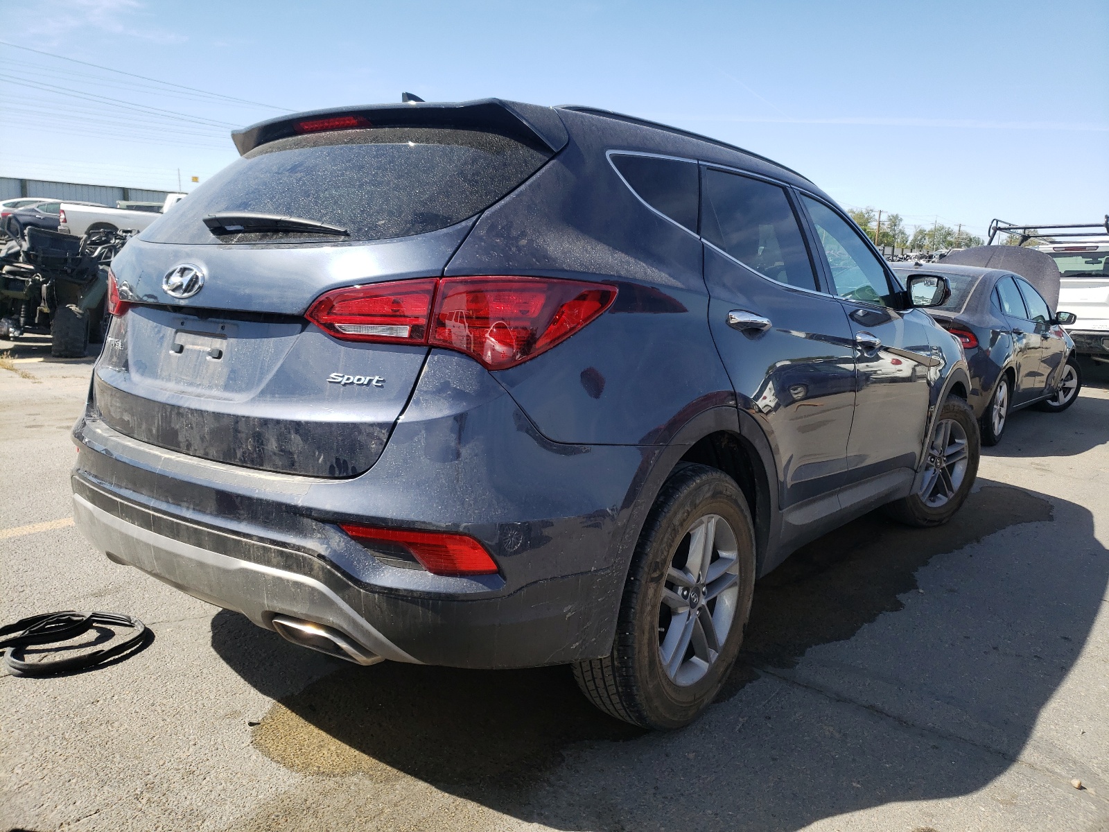 Photo 4 from auction – 2017 HYUNDAI SANTA FE S with VIN 5NMZU3LB7HH015312
