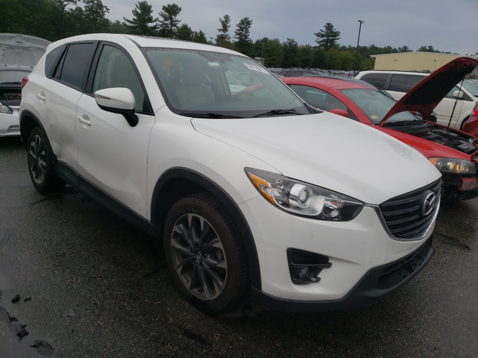 MAZDA CX-5 GT 2016 with VIN JM3KE4DY0G0691131 - Photo from auction