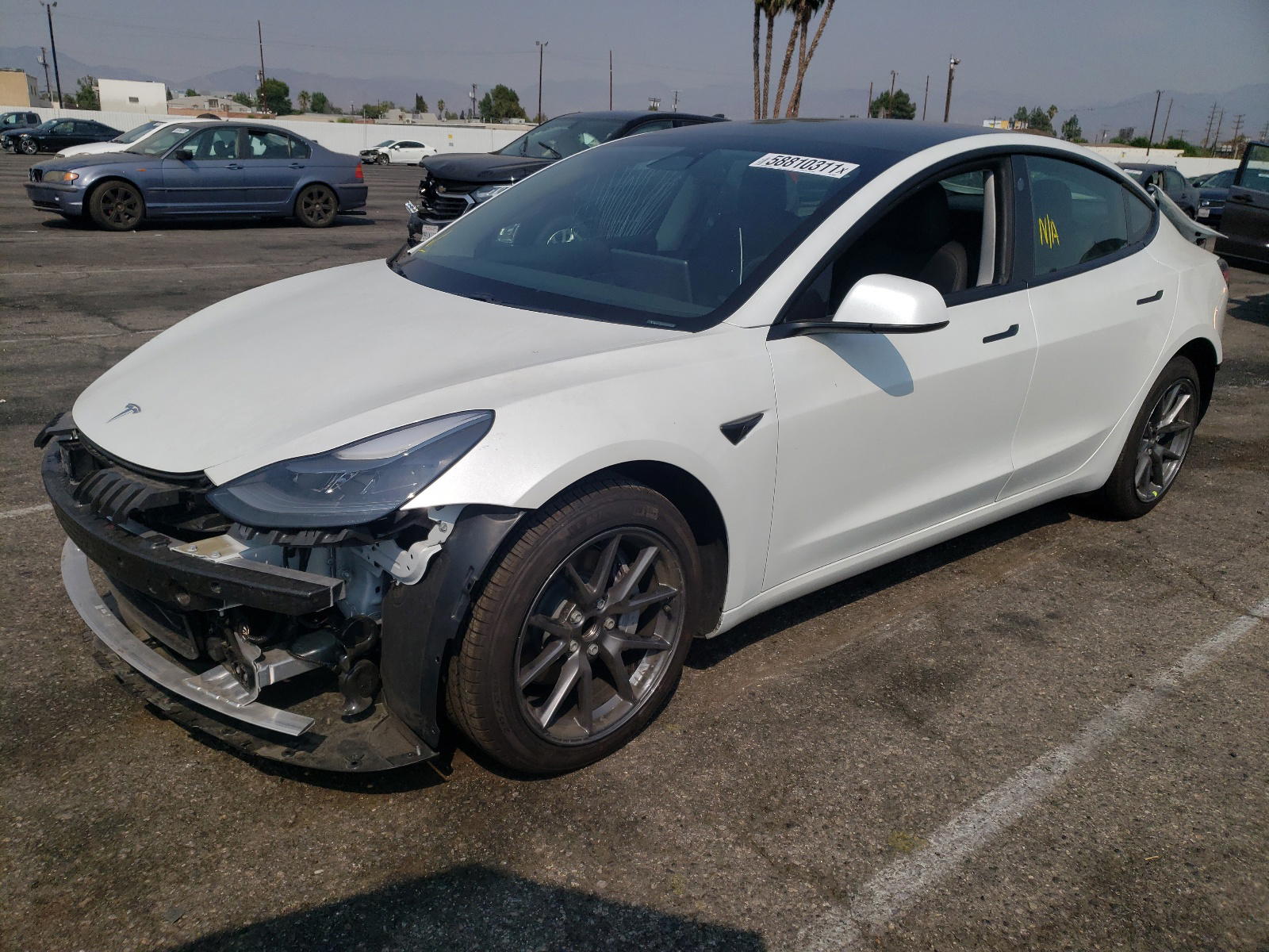 Photo 2 from auction – 2021 TESLA MODEL 3 with VIN 5YJ3E1EA1MF940241